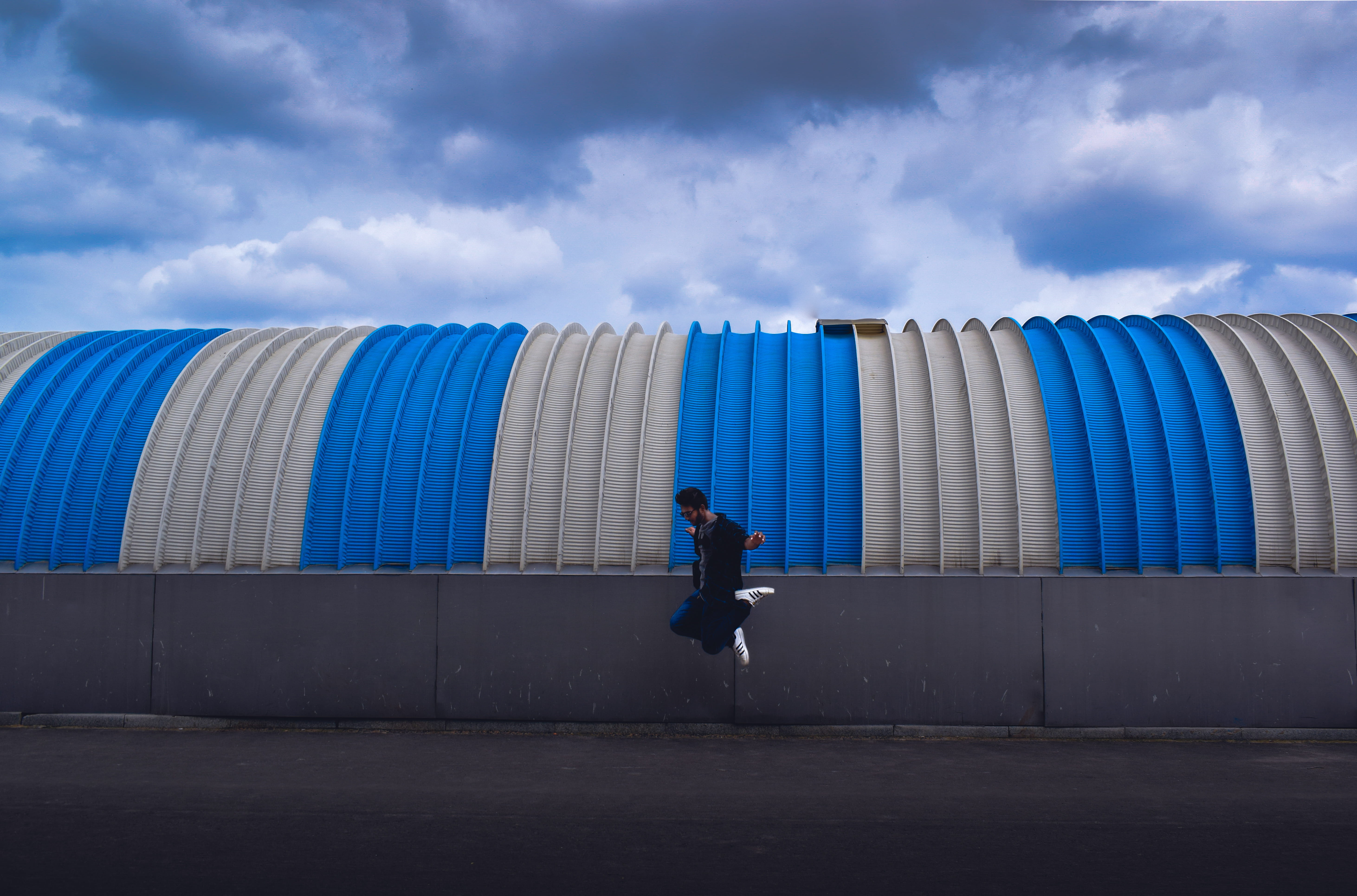 blue, sport, ahmedabad, men, motion, digital composite, architecture, india, cloud - sky, built structure, businessman, one person, lifestyles, young adult, HD Wallpaper