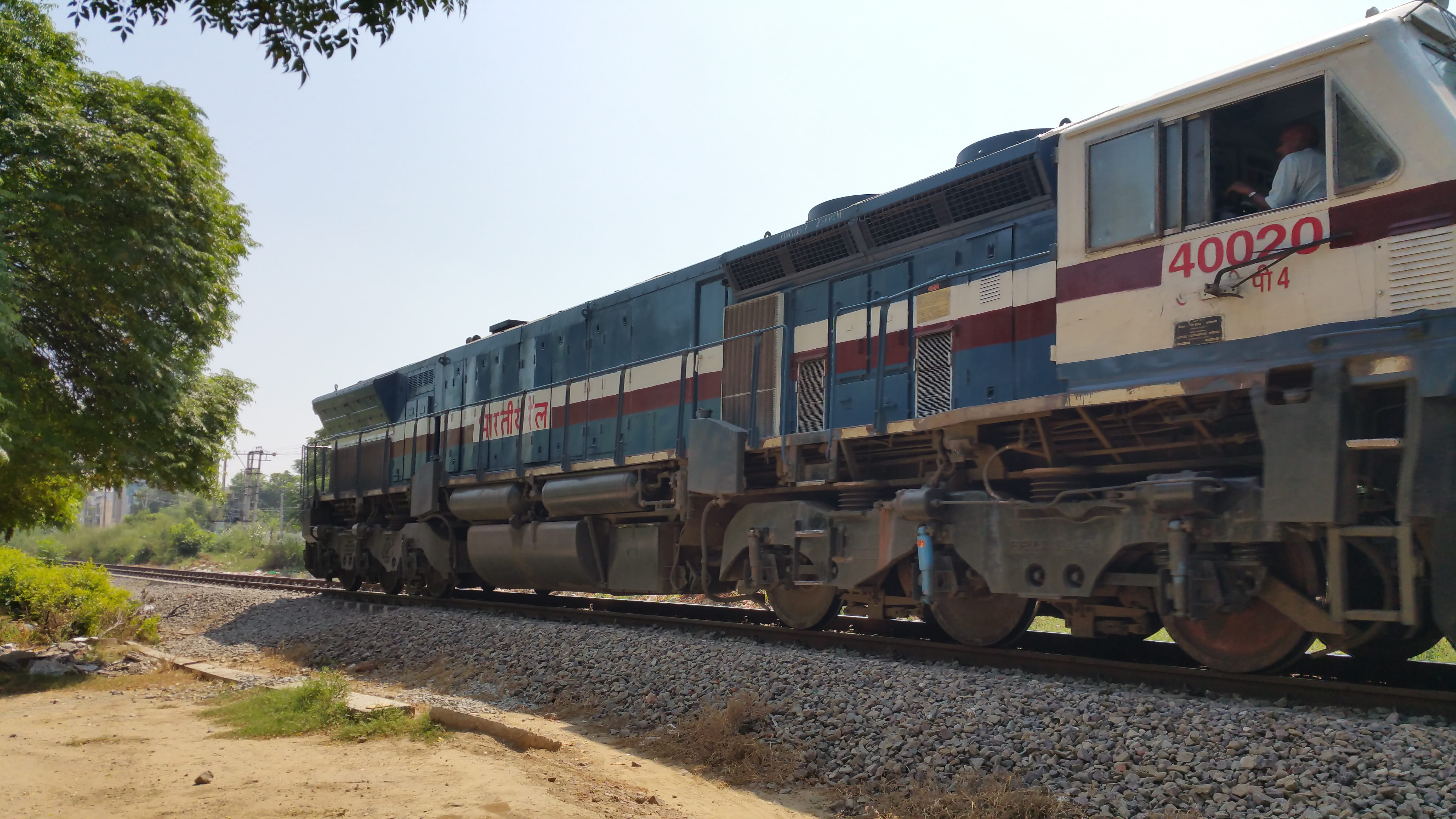 nature, motion, plant, train, train - vehicle, gravel, 5K, patiala, day, track, wdp4, sunlight, tree, railways, outdoors, no people, clear sky, railroad track, HD Wallpaper