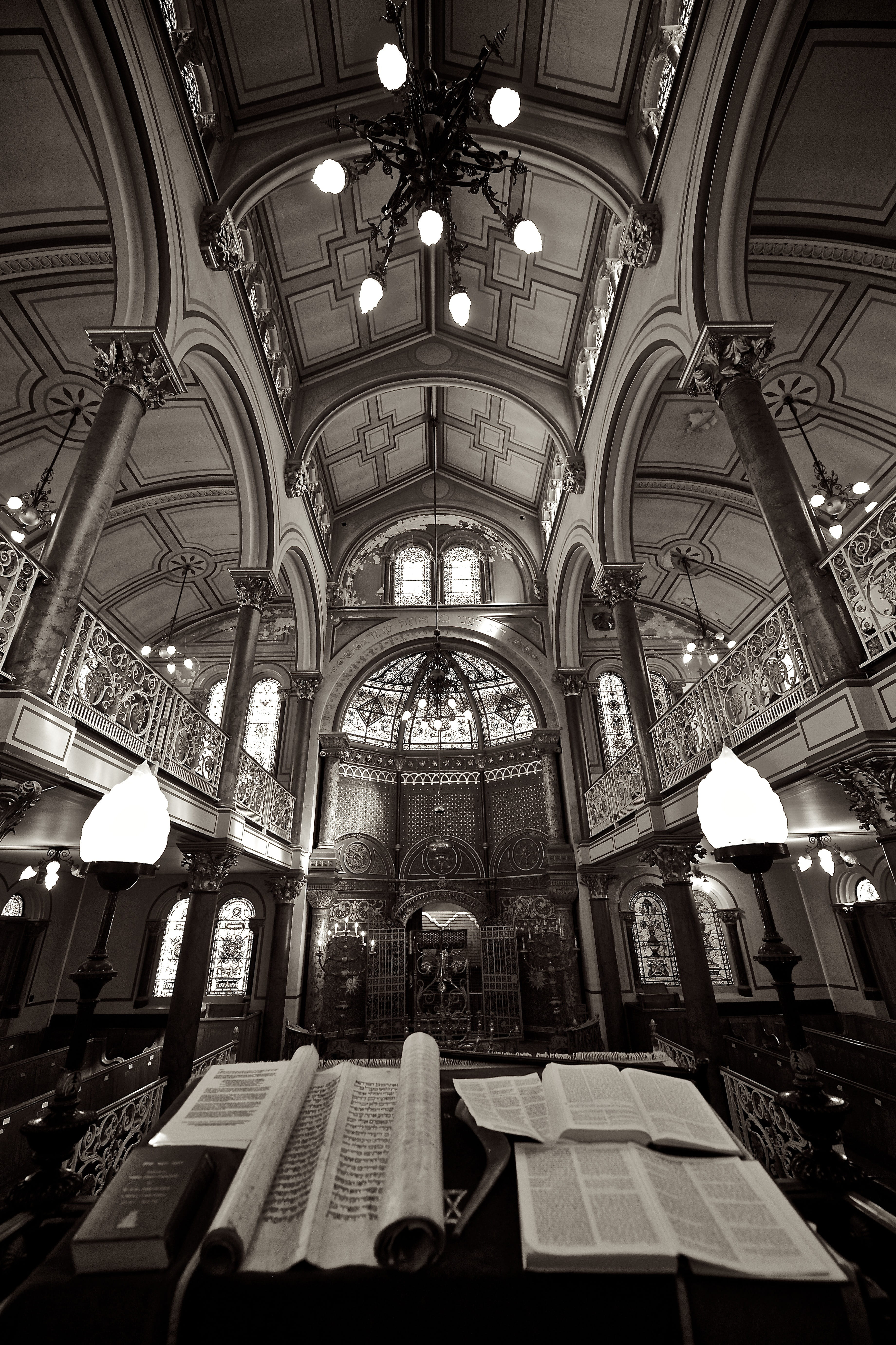 lighting equipment, built structure, table, arch, bible, architecture, no people, religious, indoors, books, monochrome, photography, cathedral, illuminated, Phone HD Wallpaper