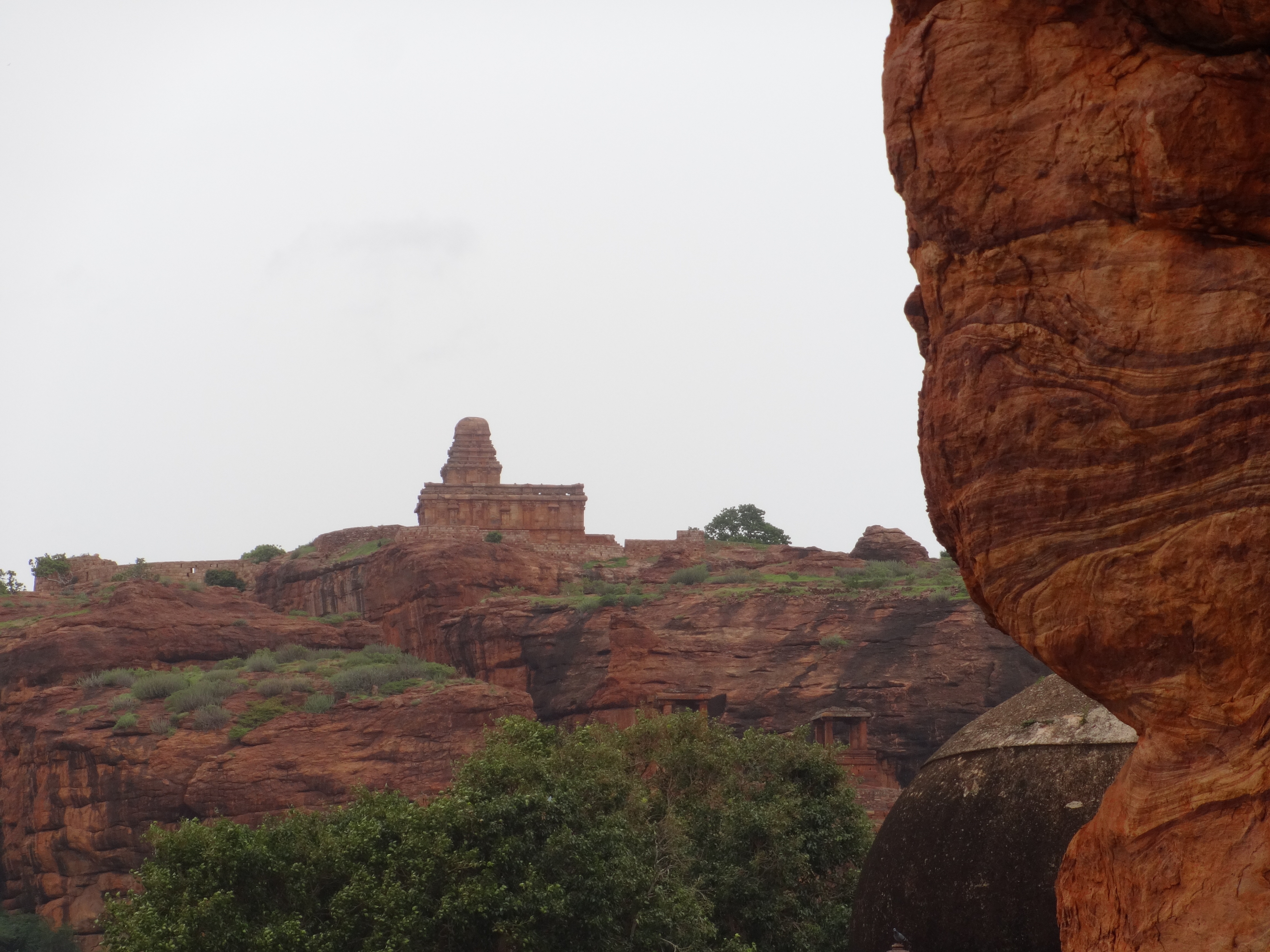 tree, low angle view, red, sand stone, formation, cave temple, travel, religion, scenics - nature, travel destinations, sky, rock formation, tranquil scene, HD Wallpaper