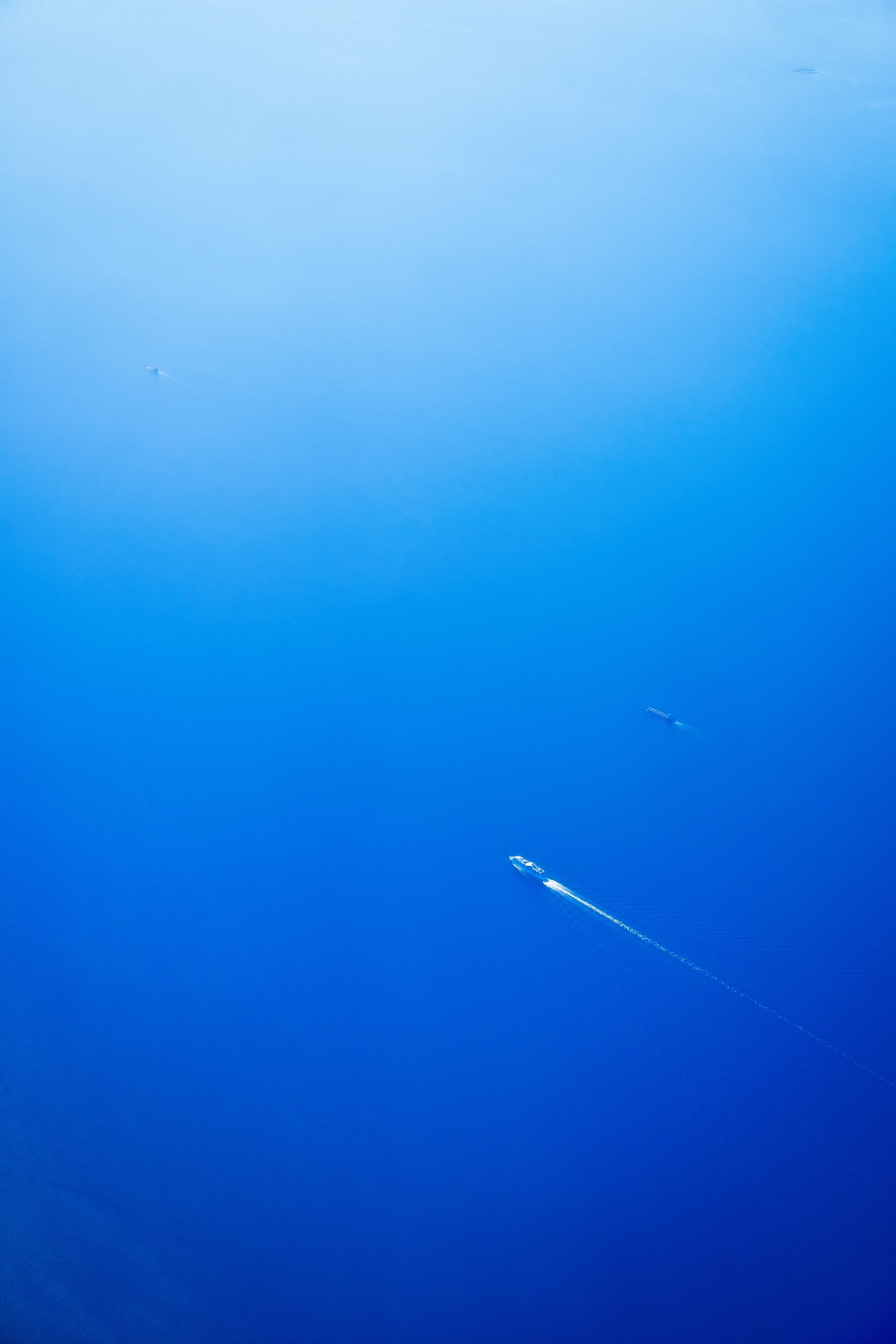 water, vapor trail, leaving, flora, above, air vehicle, sea, minimal, blue, airplane, 4K, copy space, cloud - sky, beauty in nature, Phone HD Wallpaper