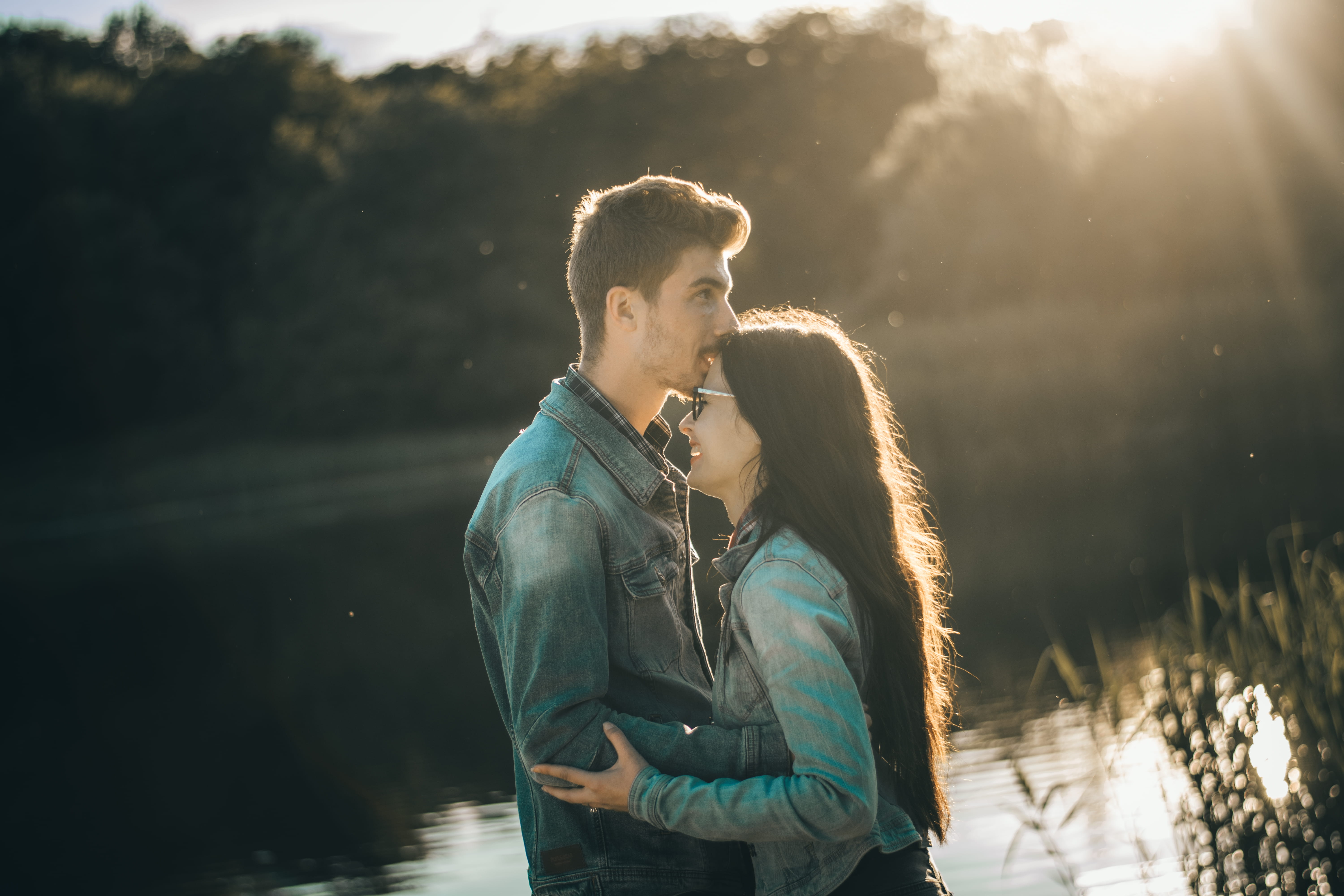 real people, kissing, outdoors, young men, lake, lifestyles, men, lens flare, nature, togetherness, heterosexual couple, bonding, front, young adult, man, HD Wallpaper