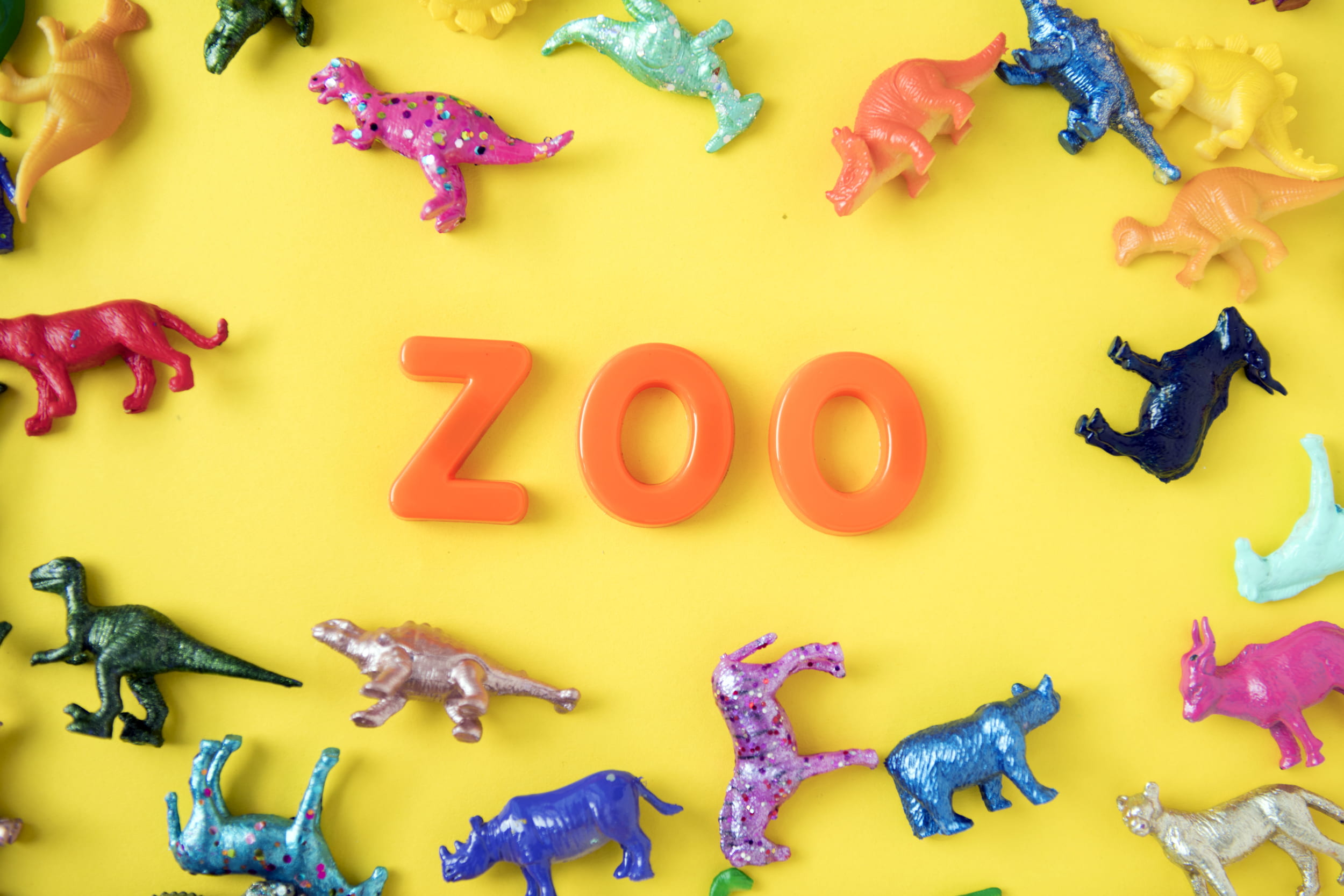 zoo, animal, toy, yellow, indoors, colored background, choice, no people, letter, knolling - concept, assorted, still life, multi colored, number, studio shot, HD Wallpaper