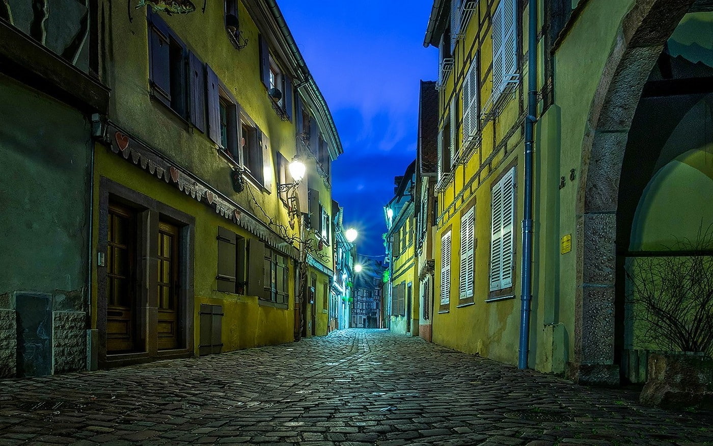 landscape urban street lights evening strasbourg france architecture cobblestone city, illuminated, no people, outdoors, long, alley, narrow, diminishing perspective, HD Wallpaper