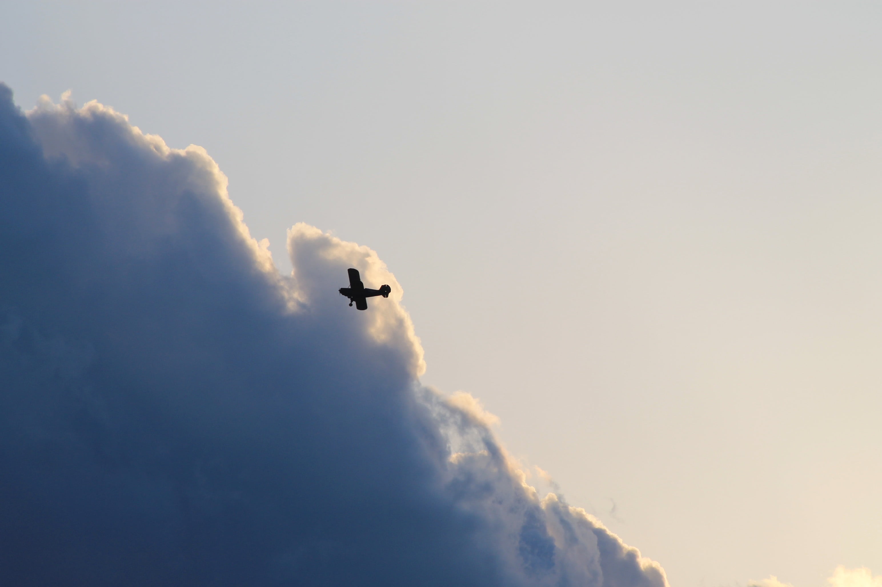 storm, day, air vehicle, speed, flight, risk, wing, airshow, plane, split, thunderclouds, aviation, bi-plane, fly, 2K, low angle view, cloud - sky, transportation, HD Wallpaper