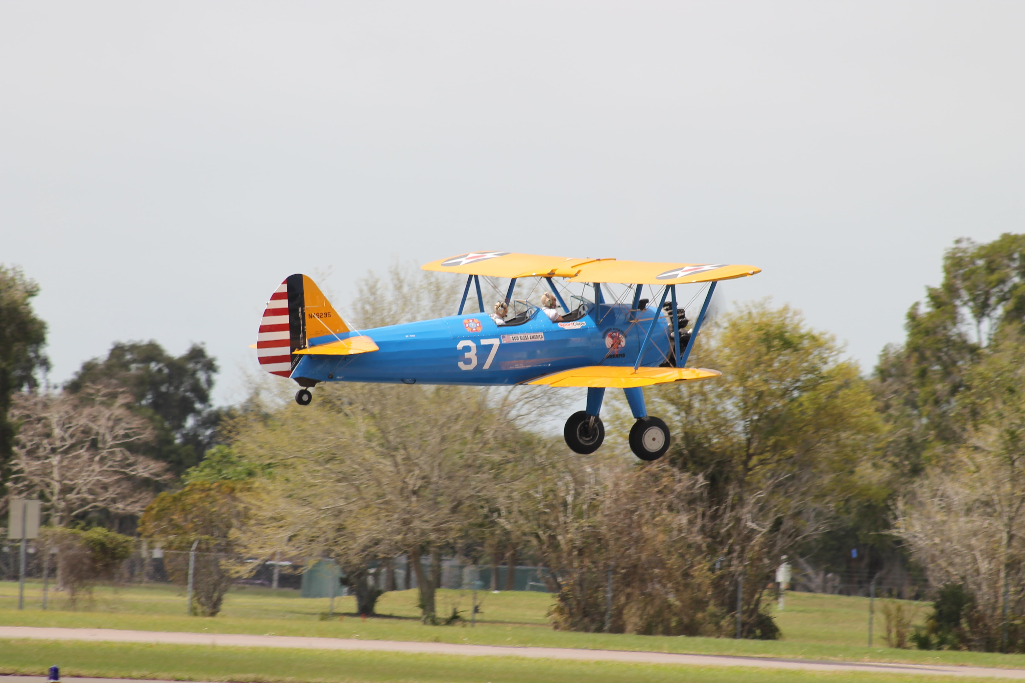 plant, bi-plane, travel, military, war, plane, fly, copy space, biplane, retro, vintage, motion, air, flight, outdoors, flying, wing, pilot, day, leisure activity, HD Wallpaper