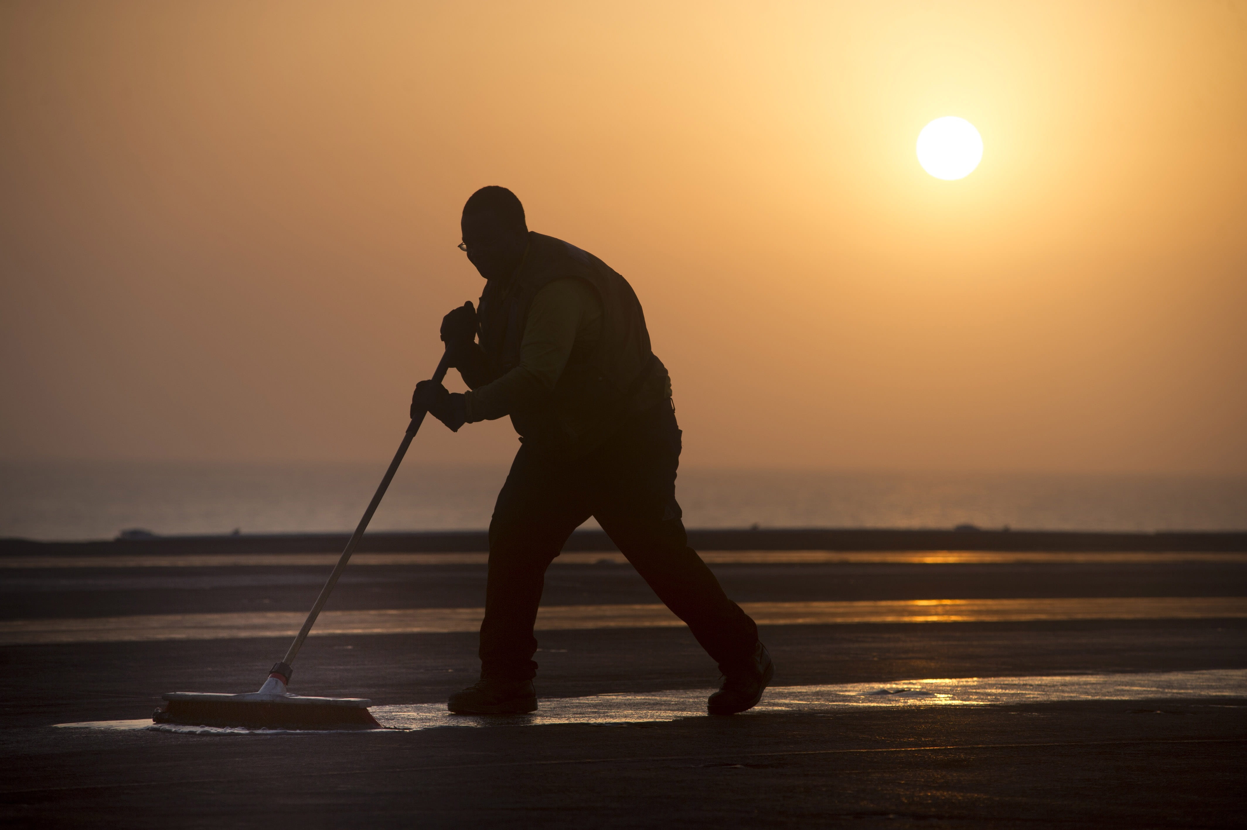 nature, water, flight deck, beauty in nature, scrubbing, cleaning, lifestyles, man, men, aircraft carrier, one person, sky, silhouette, orange color, sea, HD Wallpaper