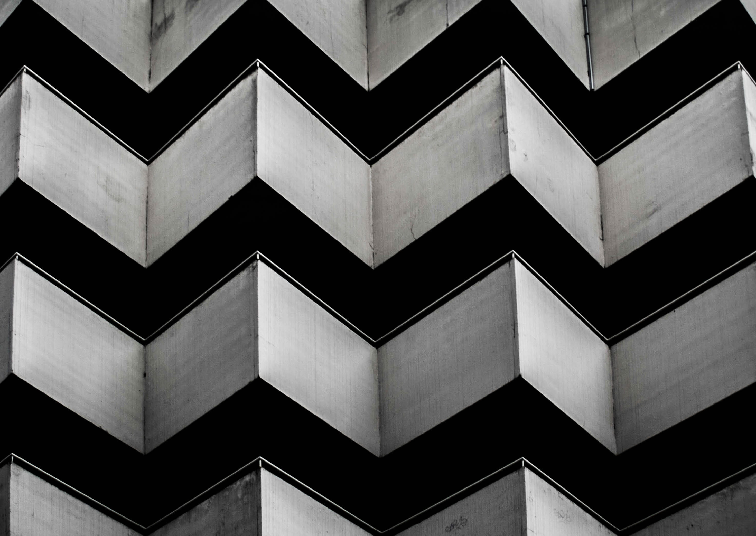 symmetry, full frame, wall - building feature, chevron, shape, black, window, geometric shape, pattern, grey, architecture, close-up, built structure, HD Wallpaper