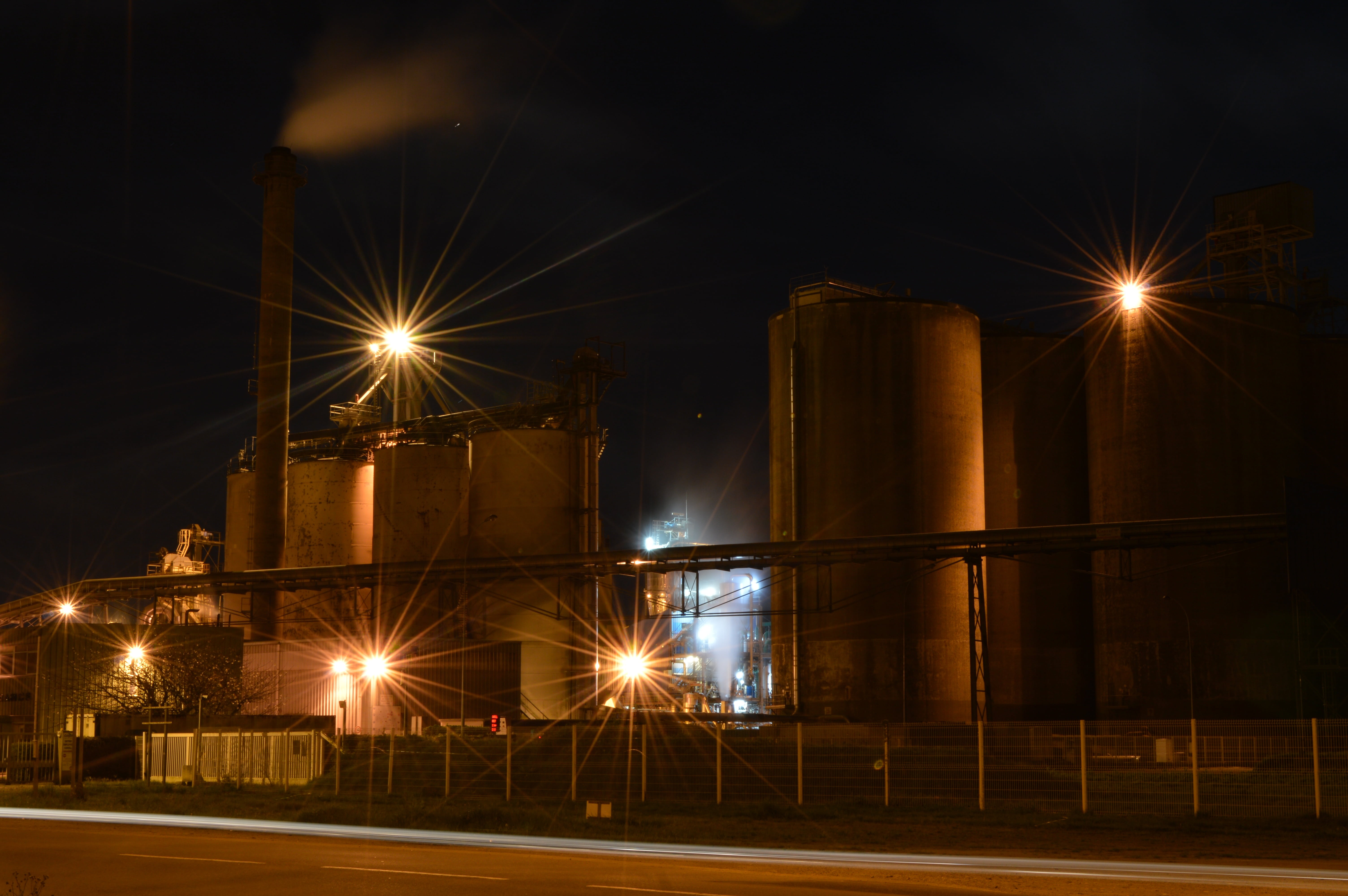 outdoors, night, street light, business, steel, factory, lens flare, lighting equipment, 5K, building exterior, illuminated, oil industry, industry, high, HD Wallpaper