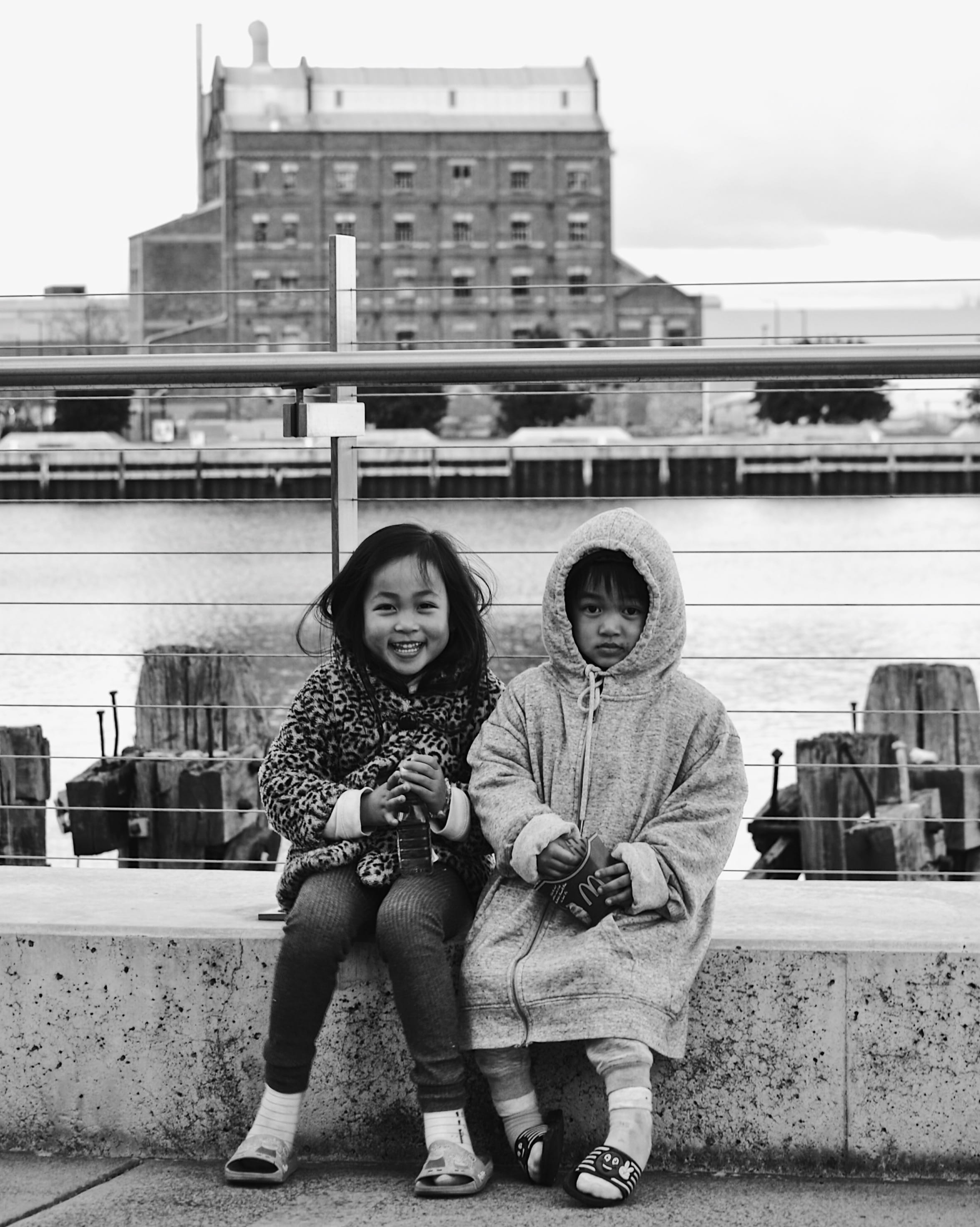 sibling, family, bonding, girls, hart’s mill, australia, front view, port adelaide, 2K, casual clothing, building exterior, females, built structure, full length, Phone HD Wallpaper