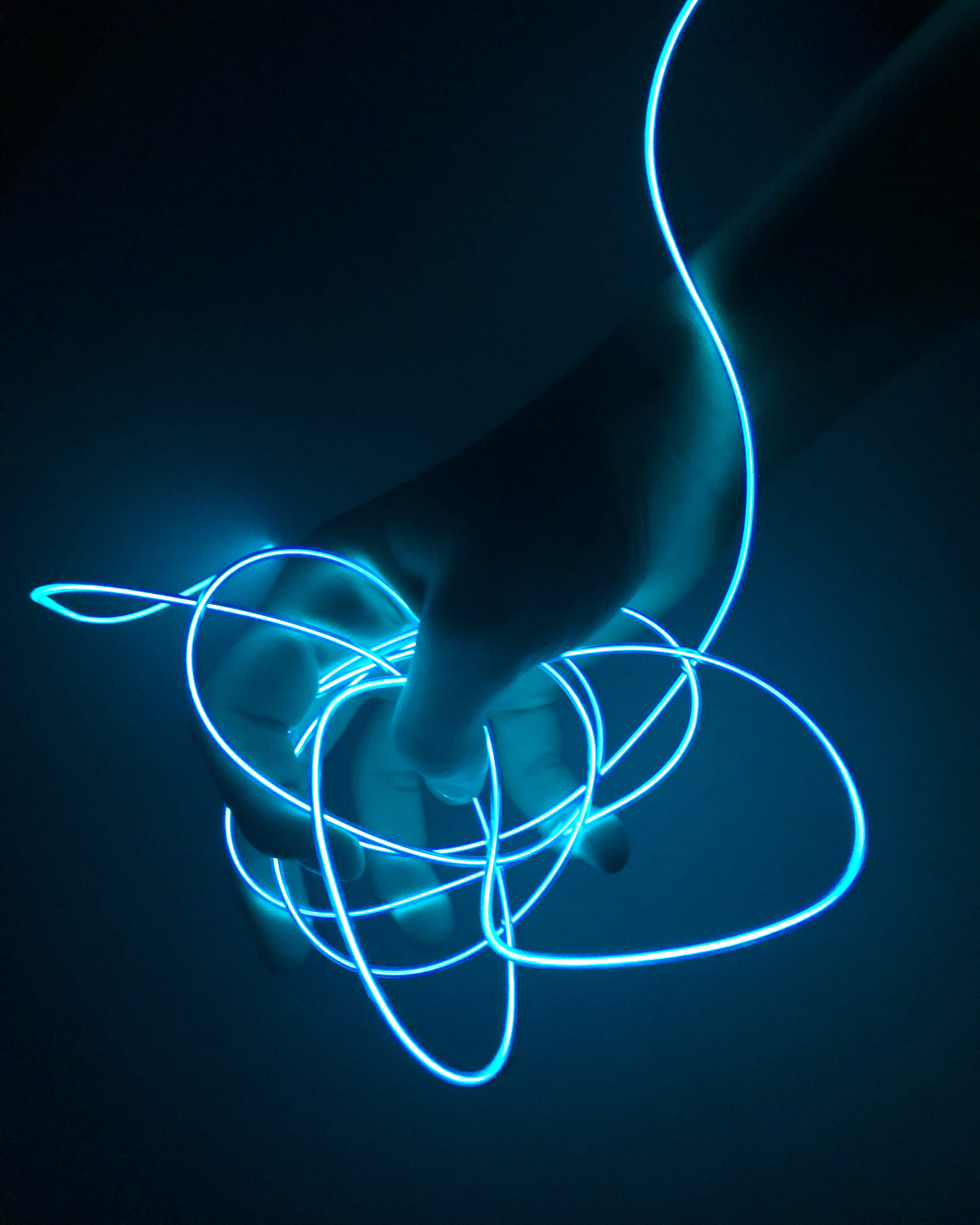 2K, futuristic, person, light, creativity, neon light, evening, illuminated, hand, holding, night, dark, indoors, long exposure, connection, black background, Phone HD Wallpaper