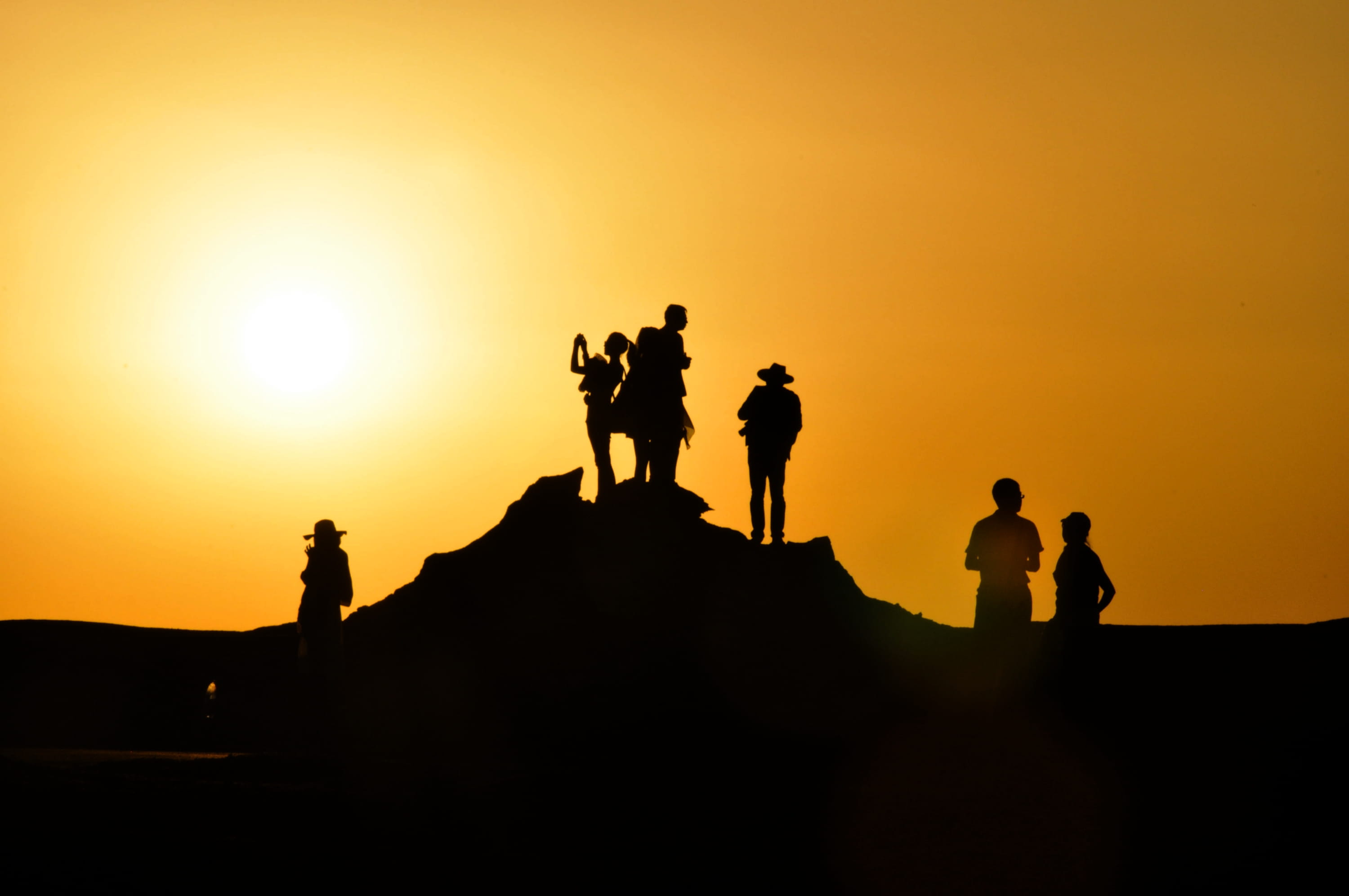 photography, lifestyles, golden hour, leisure activity, sunshine, sun, back Lit, clear sky, group Of People, human representation, men, orange, hill, real people, HD Wallpaper