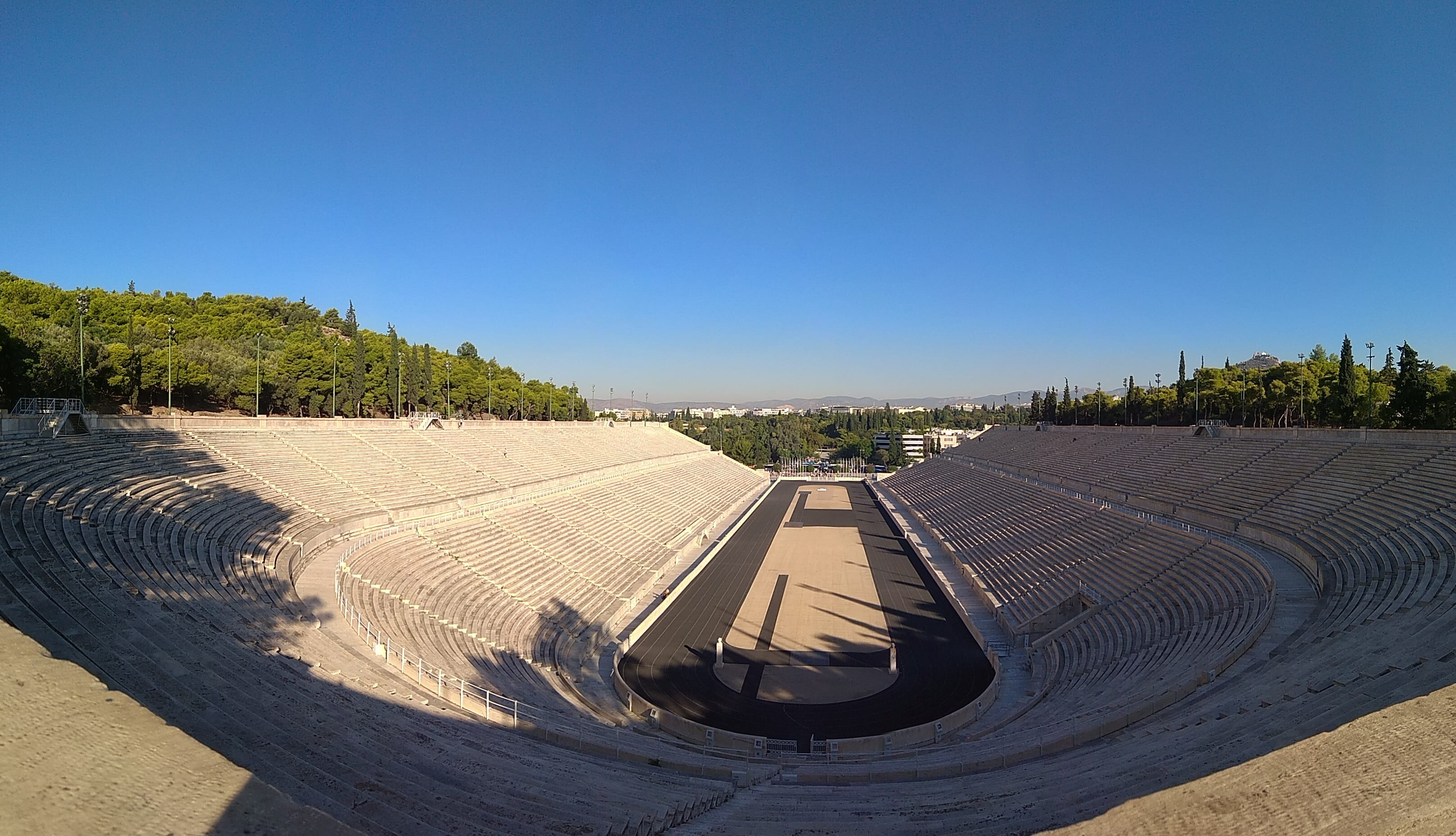 direction, copy space, seat, high angle view, olympic games, blue, day, sky, tree, shadow, nature, built structure, outdoors, plant, the way forward, sunny, HD Wallpaper