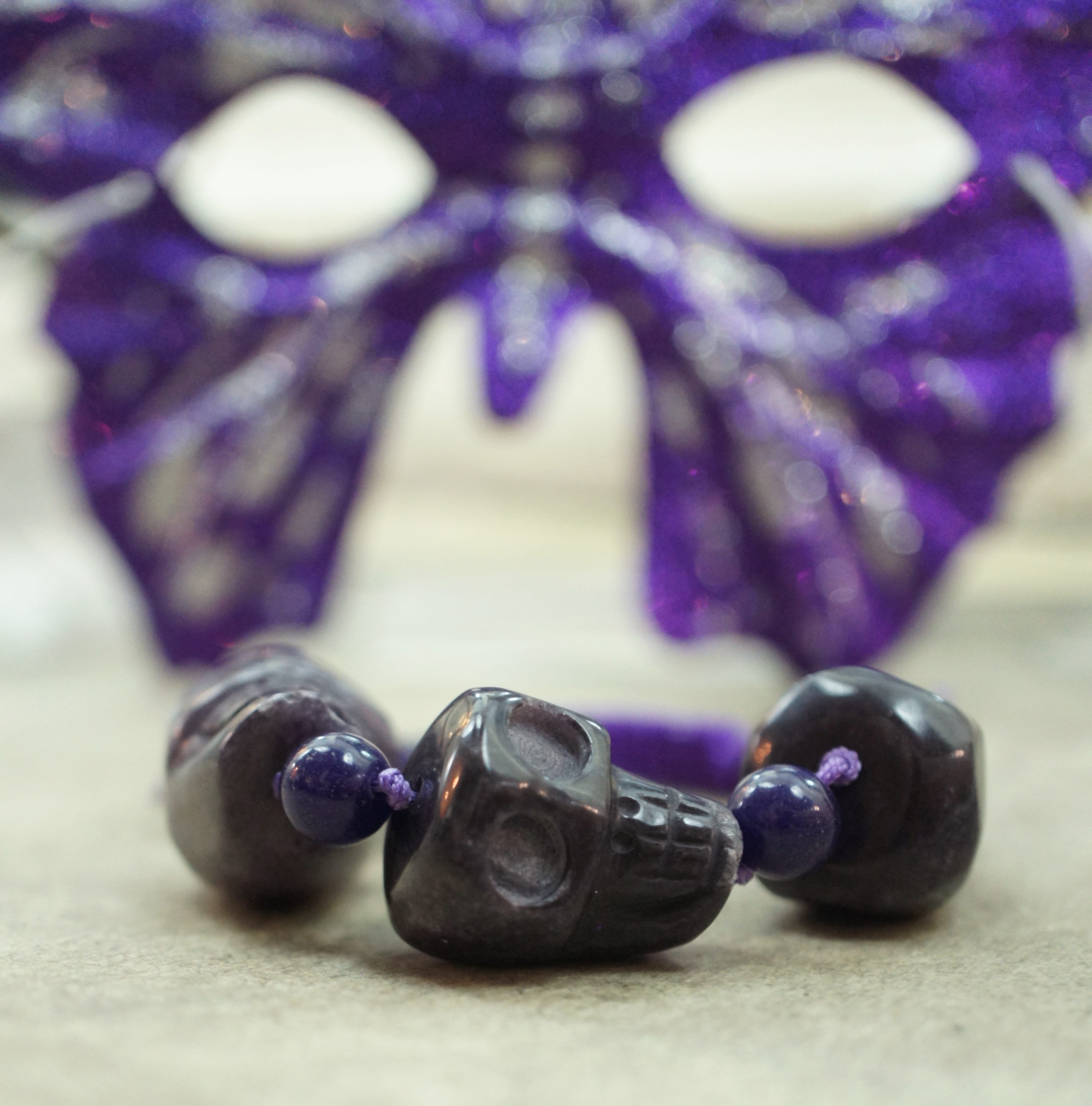jewelry, no people, handmade, table, mask, selective focus, berry fruit, bead, purple, amethyst, gemstone, necklace, gem, butterfly, skulls, food, jewellery, Phone HD Wallpaper