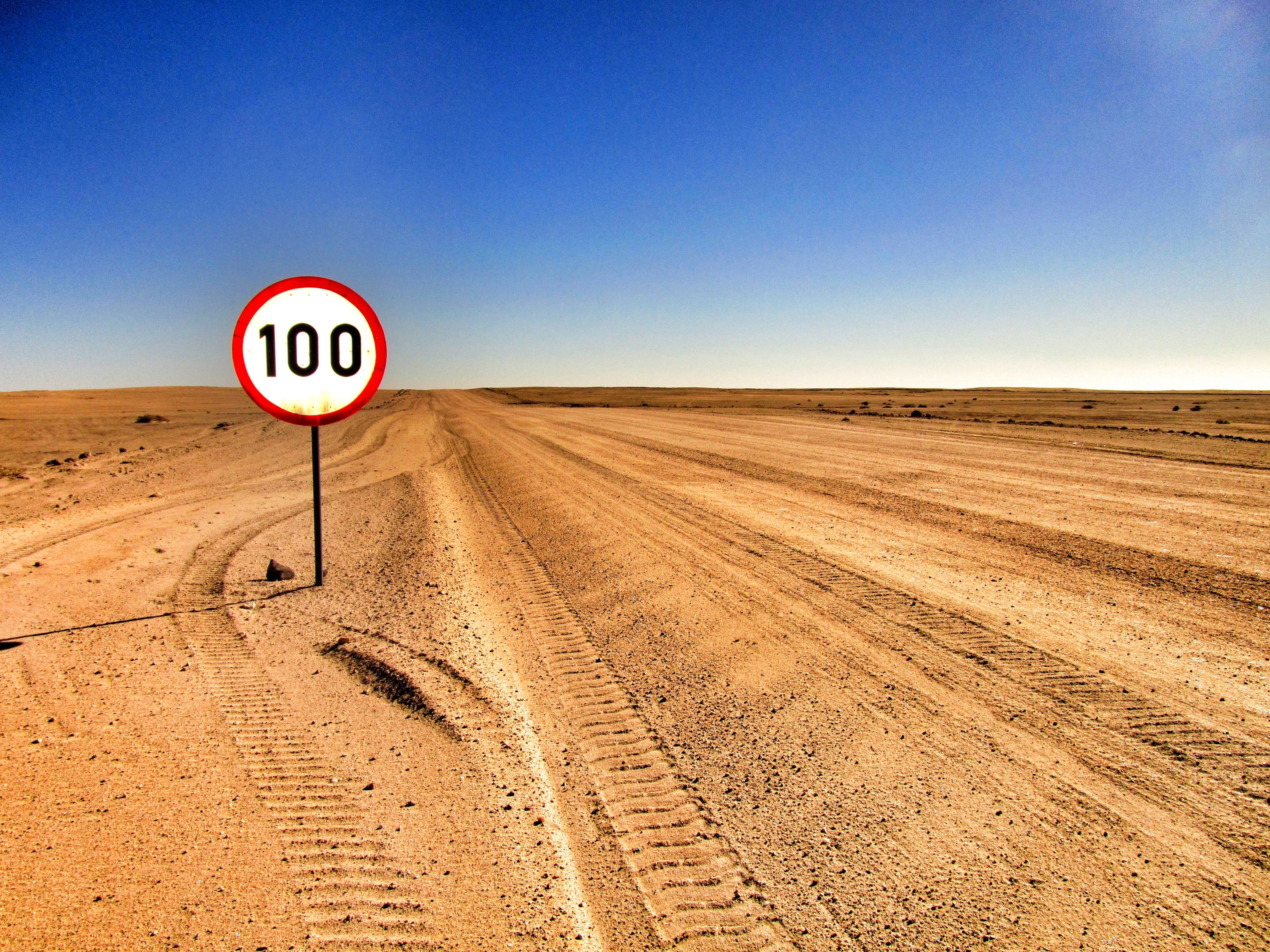outdoors, scenics - nature, red, land, direction, sand, daytime, dust, black, sign, white, no people, landscape, transportation, guidance, communication, HD Wallpaper