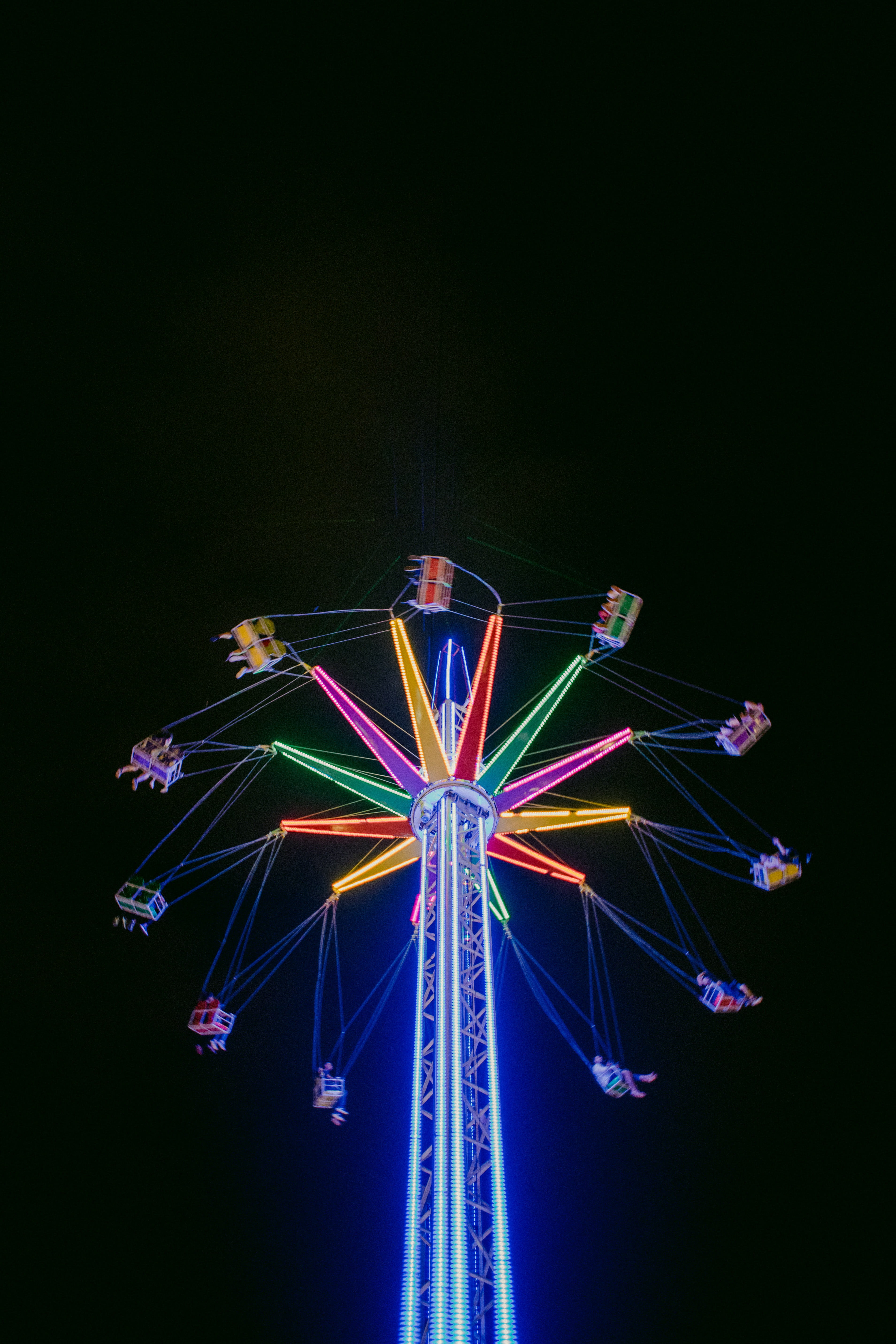 dark, funfair, carnival, arts culture and entertainment, multi colored, multicolored, riding, mary, round, illuminated, traveling carnival, spinning, night, Phone HD Wallpaper