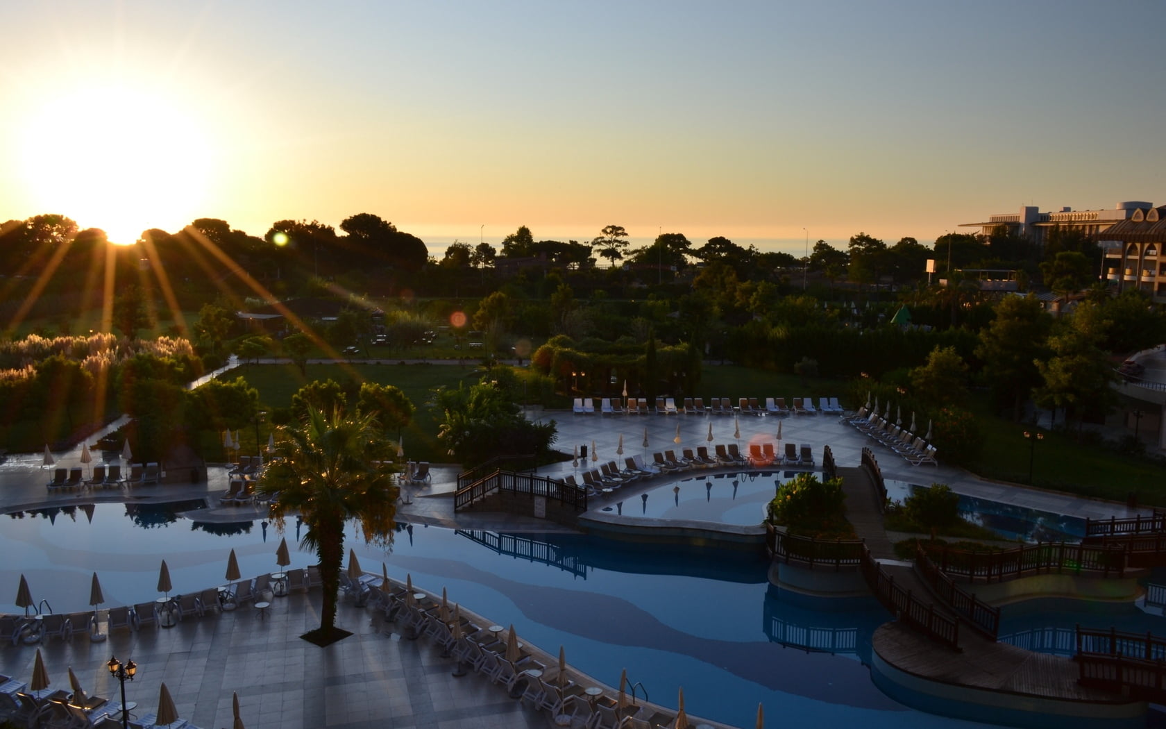 built Structure, no people, landscape, tourism, vacations, sun, clear sky, water, sunset, nature, sky, chaise lounges, outdoors, urban Scene, reflection, HD Wallpaper