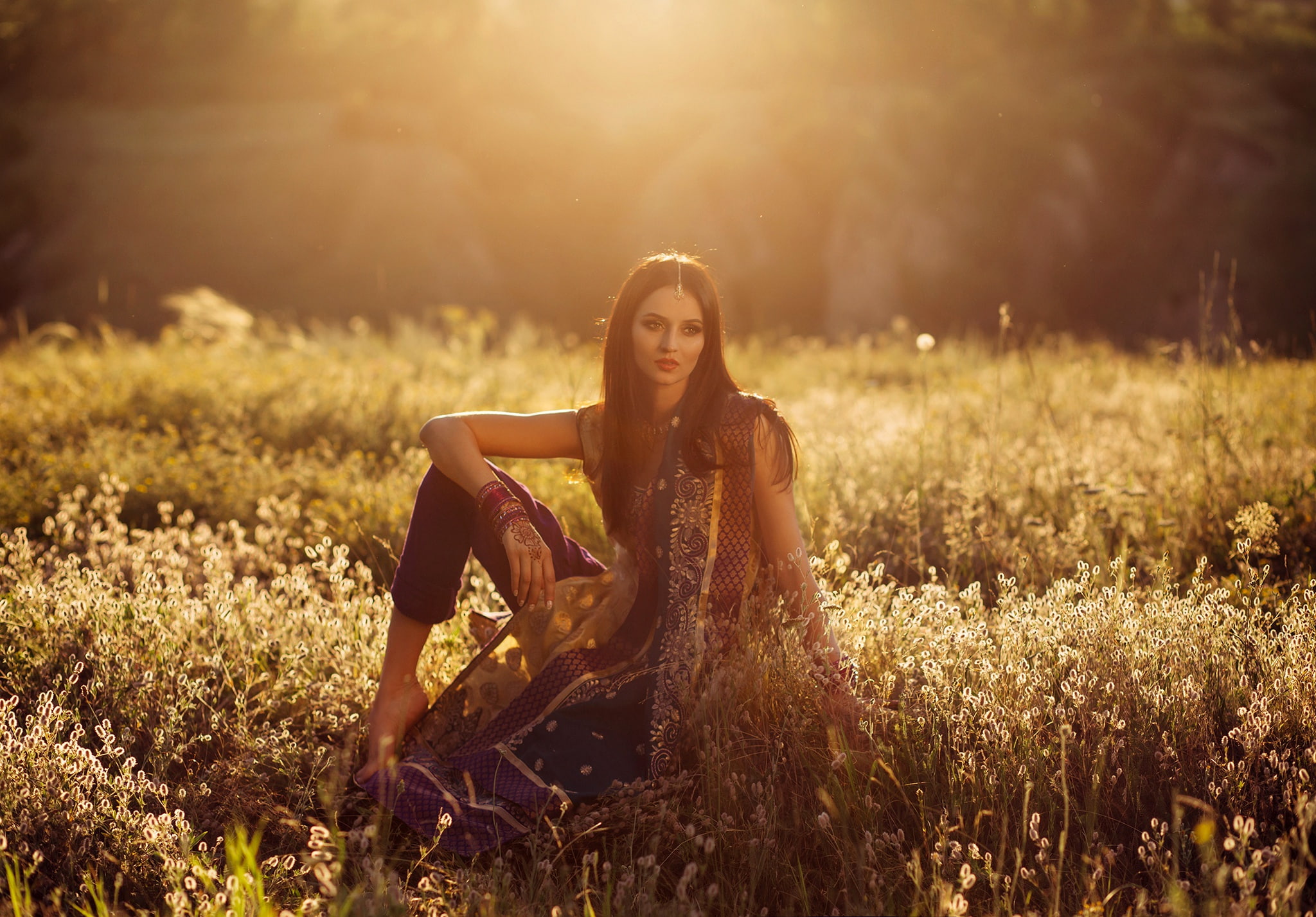brown hair, outfit, sitting, girl, the sun, beautiful, glade, 1080P, bokeh, nature, makeup, in the grass, decoration, pose, hairstyle, HD Wallpaper
