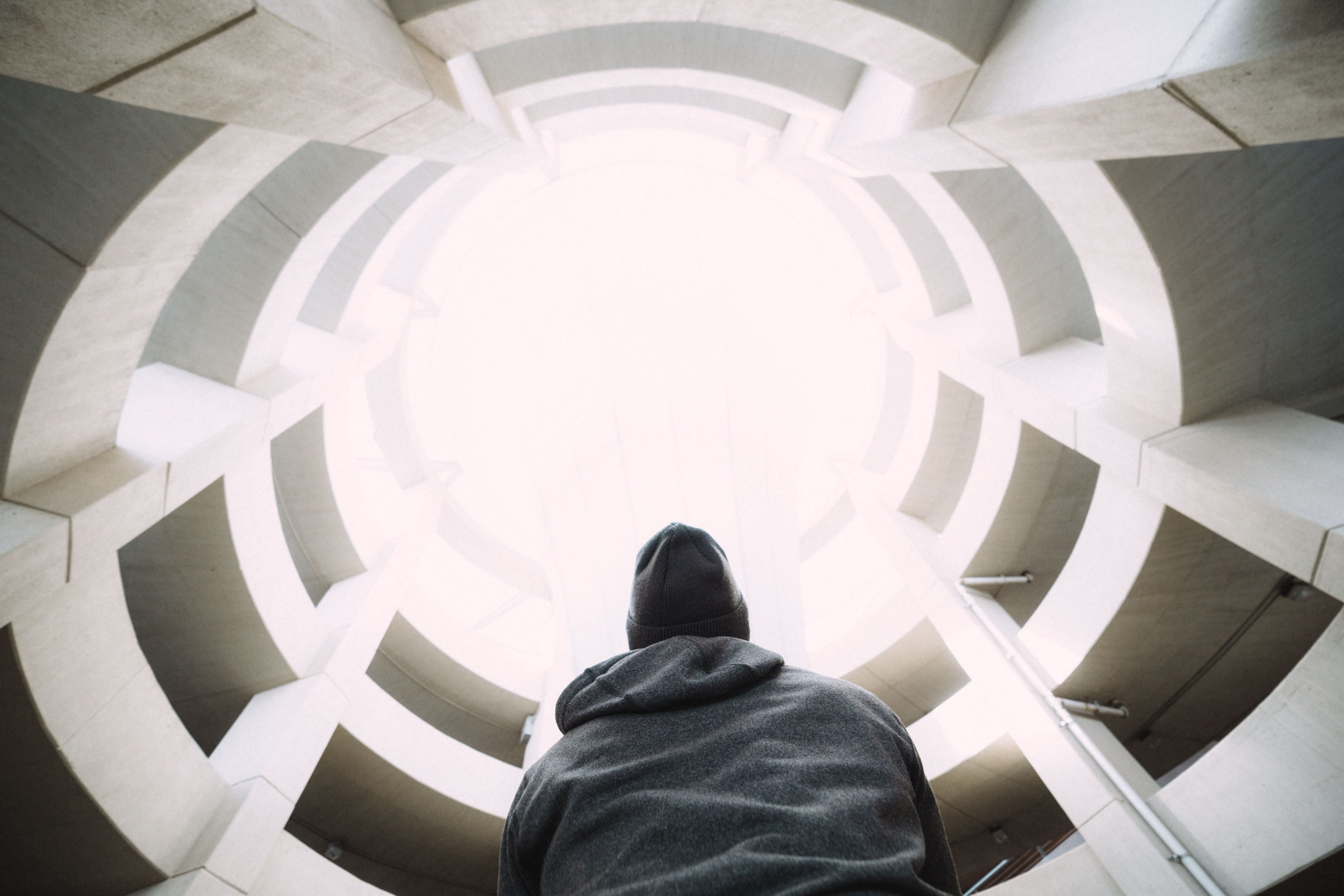 Look up, gray, jacket, adult, day, headshot, staircase, 5K, inside, looking up, person, people, man, rear view, rise, low, sweatshirt, built Structure, HD Wallpaper