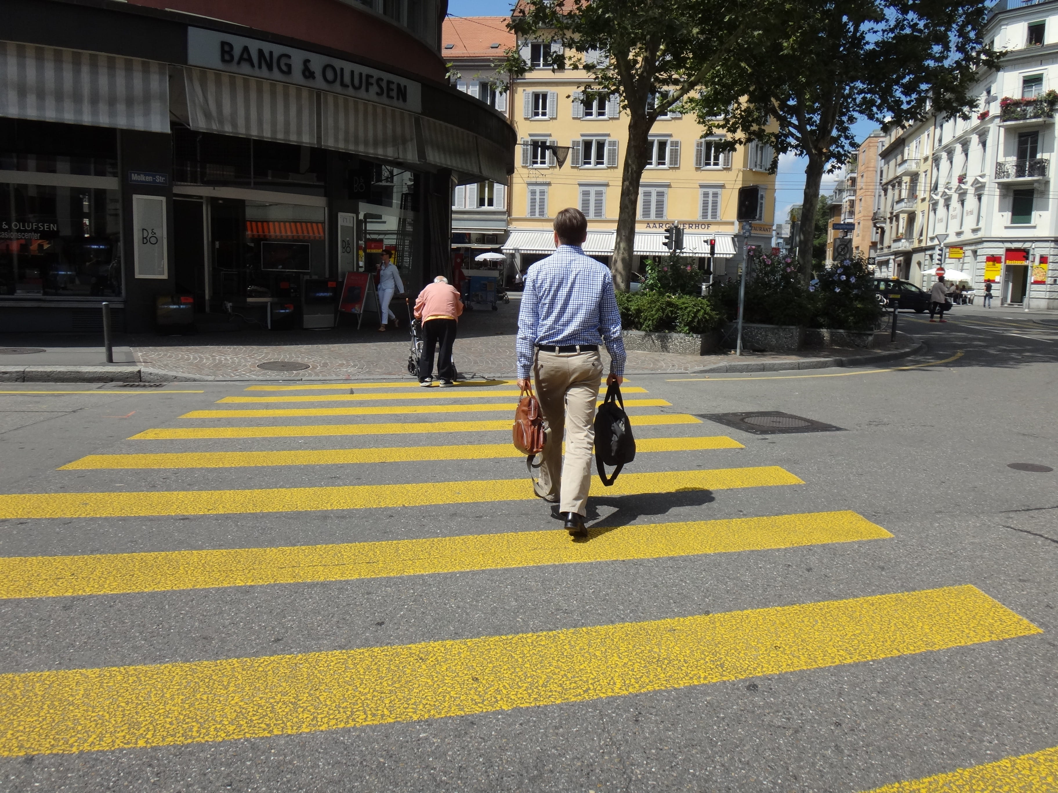 crosswalk, city Life, urban Scene, road marking, symbol, outdoors, men, color Image, people, crossing, yellow, real people, rear view, building exterior, HD Wallpaper