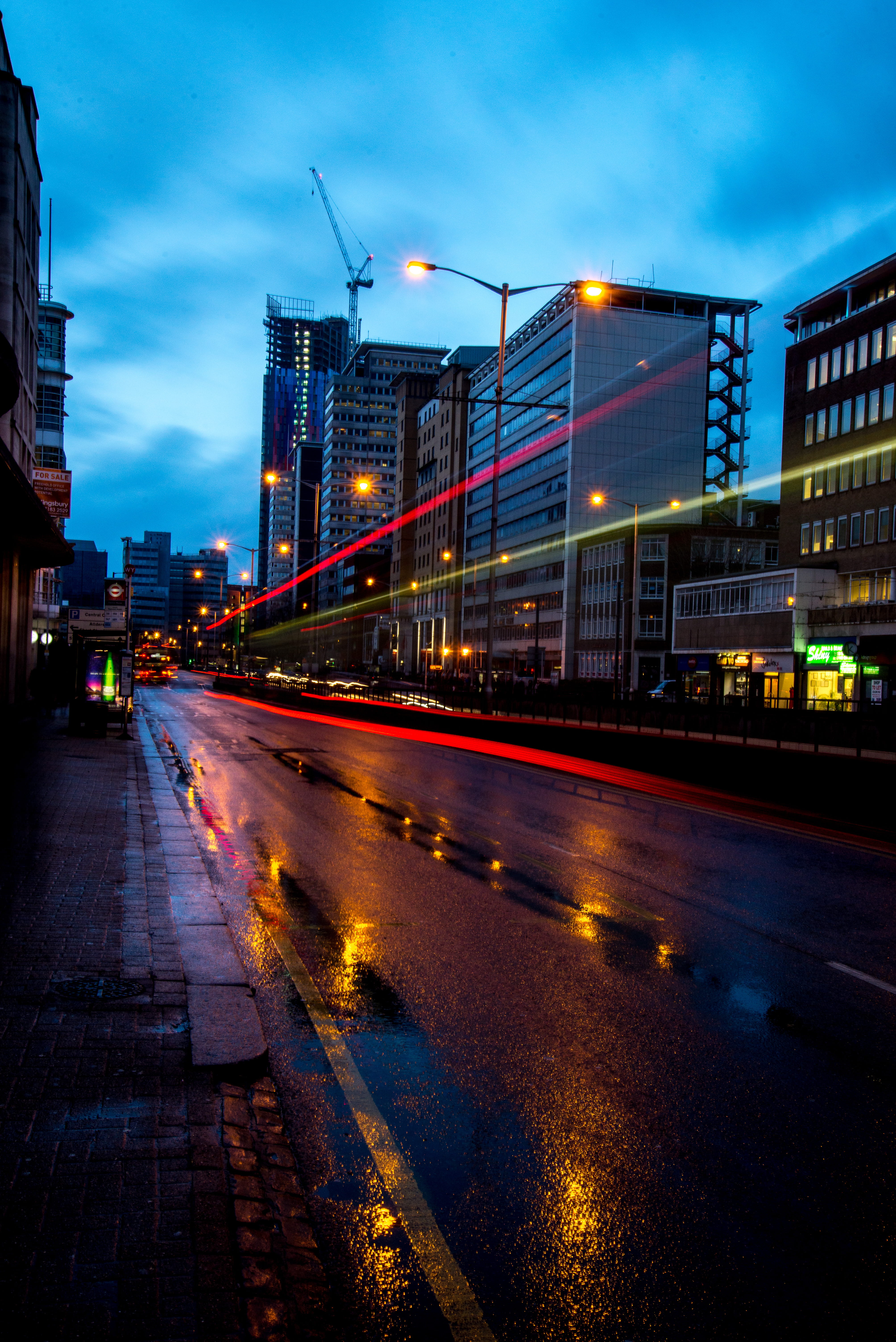 lapse, road, tarmac, town, city street, skyscraper, gray, built structure, light trail, building, office building, no people, city life, metropolis, time, Phone HD Wallpaper
