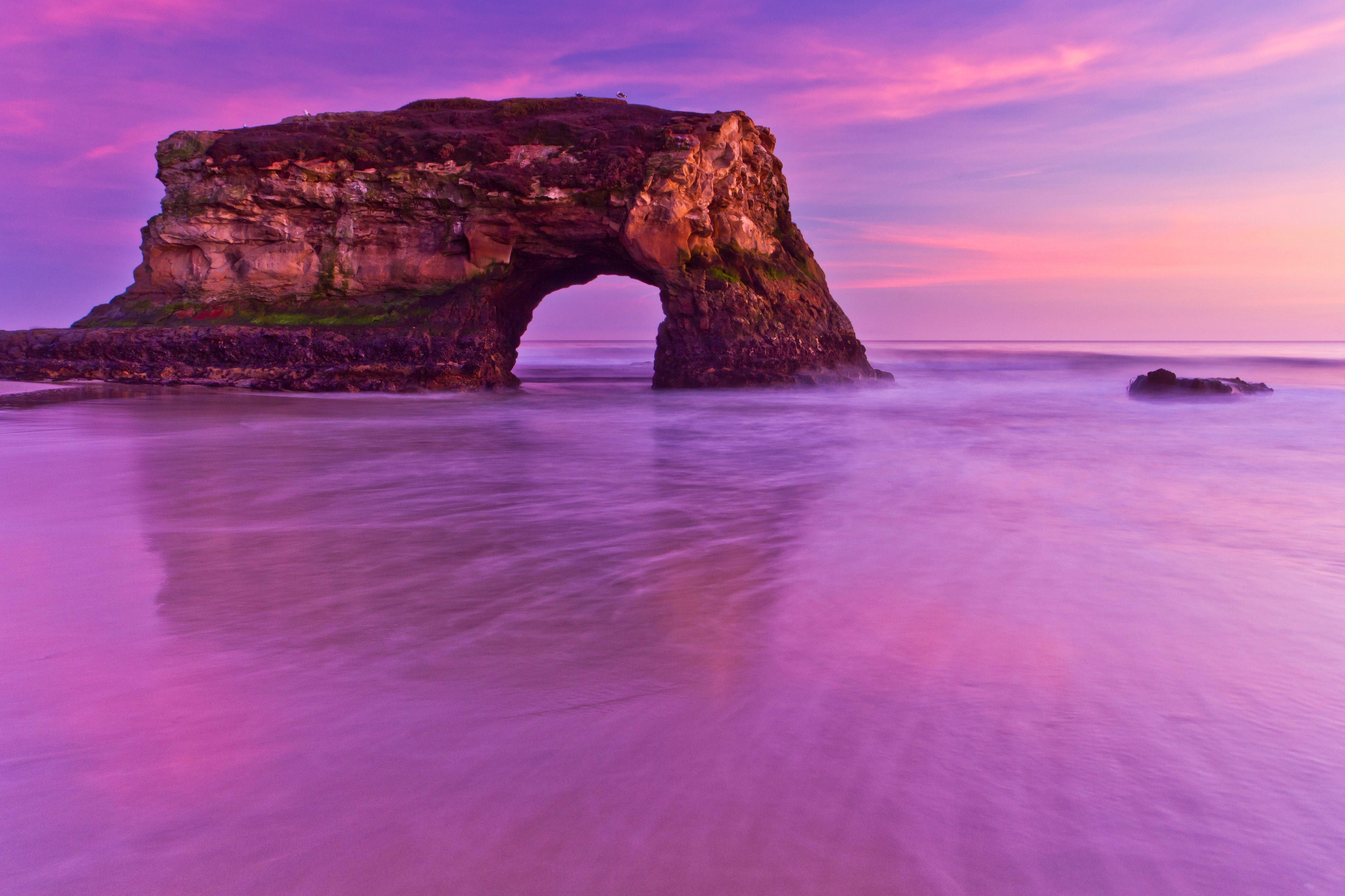 outdoors, Ocean, scenics - nature, sea, idyllic, non-urban scene, rock, eroded, sunset, Stock, tranquility, 4K, 4K, stack rock, water, Chrome OS, purple, HD Wallpaper