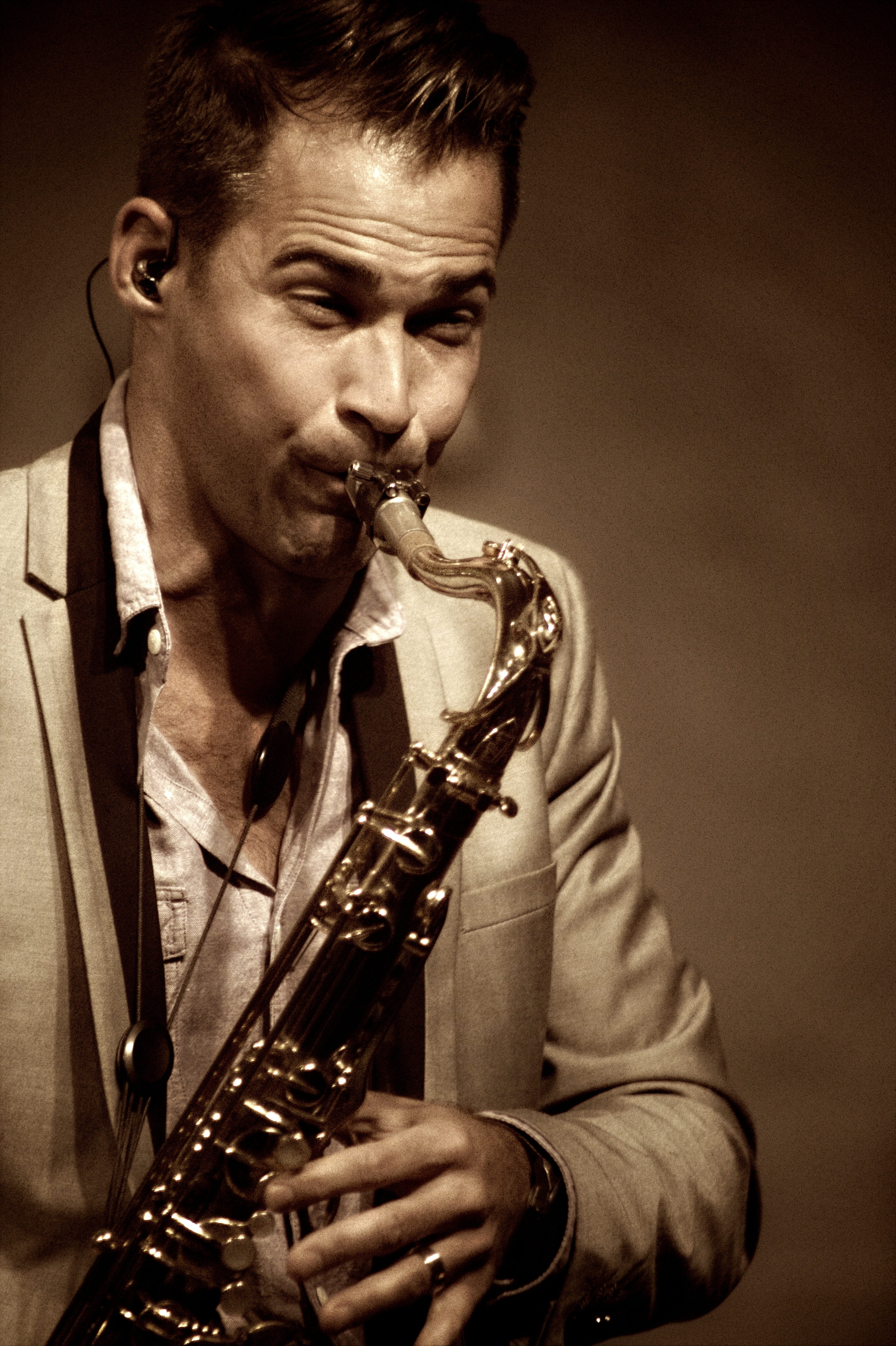 musical equipment, artist, 5K, one person, young men, sax, holding, real people, saxophone, men, musical, skill, music, portrait, solo, musician, indoors, Phone HD Wallpaper