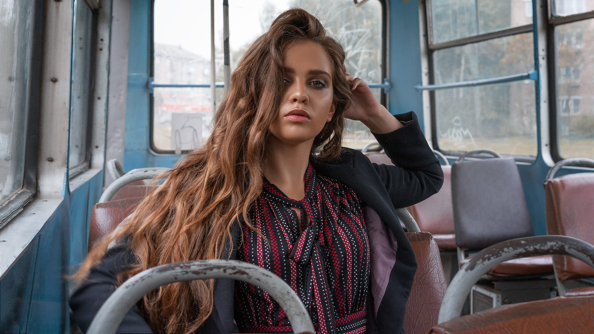 brunette, Artemy Mostovoy, hair in face, smoky eyes, Maria Smirnova, buses, portrait, hazel eyes, tanned, longhair, 1080P, sitting, women, face, wavy hair, HD Wallpaper