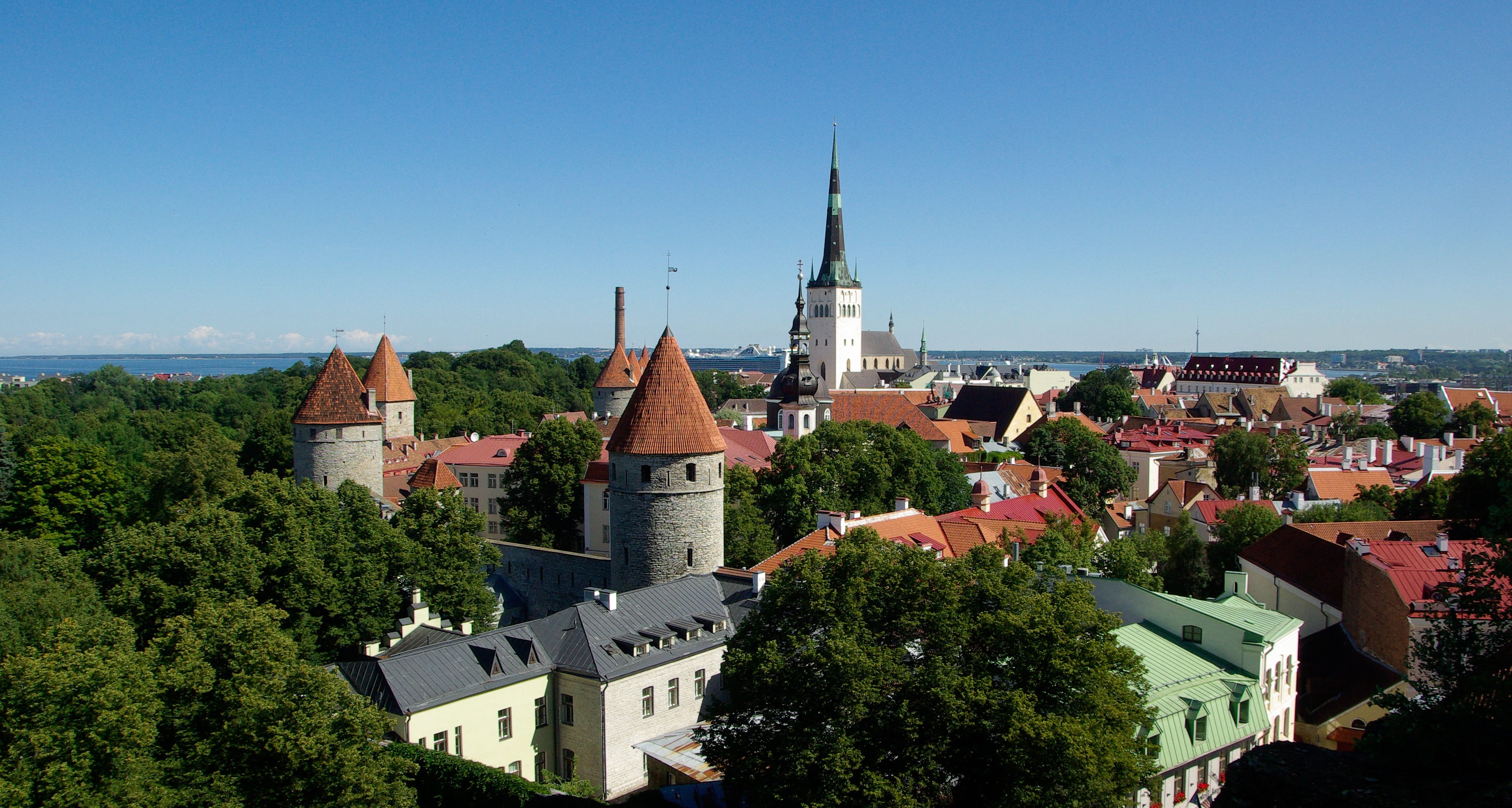 townscape, tower, day, tree, no people, aerial, sky, place of worship, 2K, belief, nature, spire, clear sky, buildings, plant, built structure, building exterior, HD Wallpaper