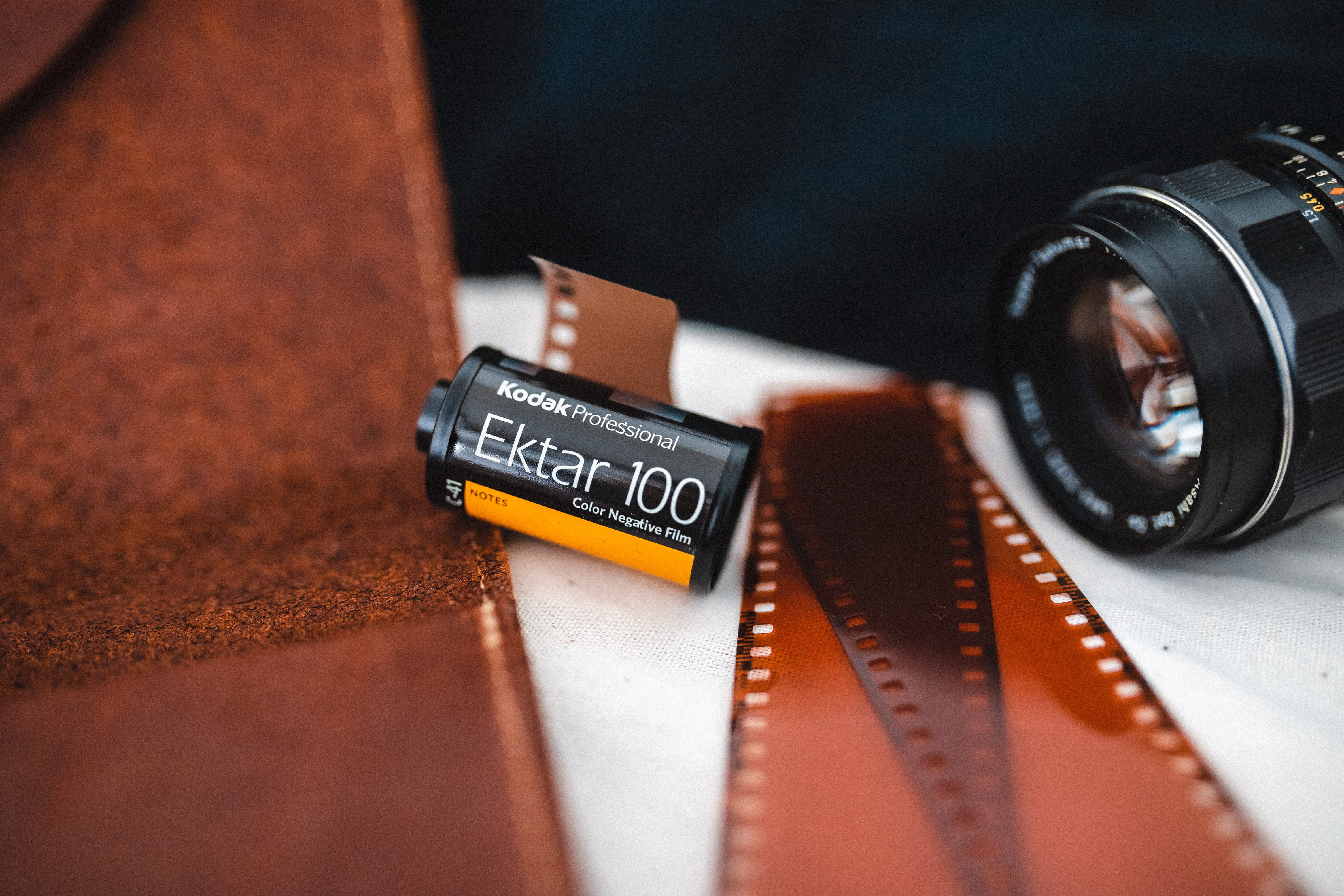 photography themes, indoors, text, no people, black, ektar, table, 4K, lens - optical instrument, kodak, camera - photographic equipment, single object, HD Wallpaper