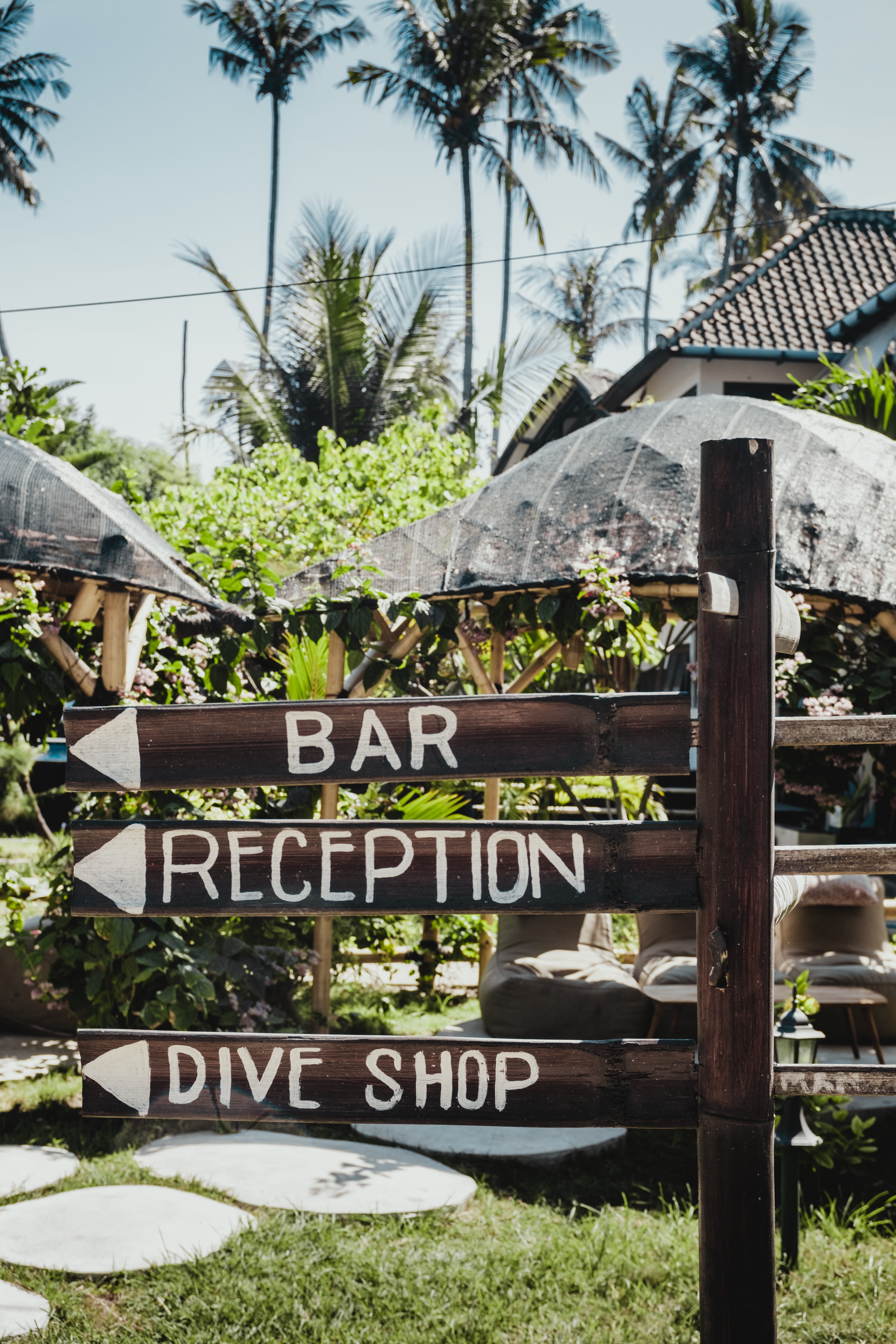 tropical climate, building exterior, sign, outdoors, holidays, nature, wood, sunlight, bali, architecture, text, day, plant, 5K, no people, built structure, Phone HD Wallpaper