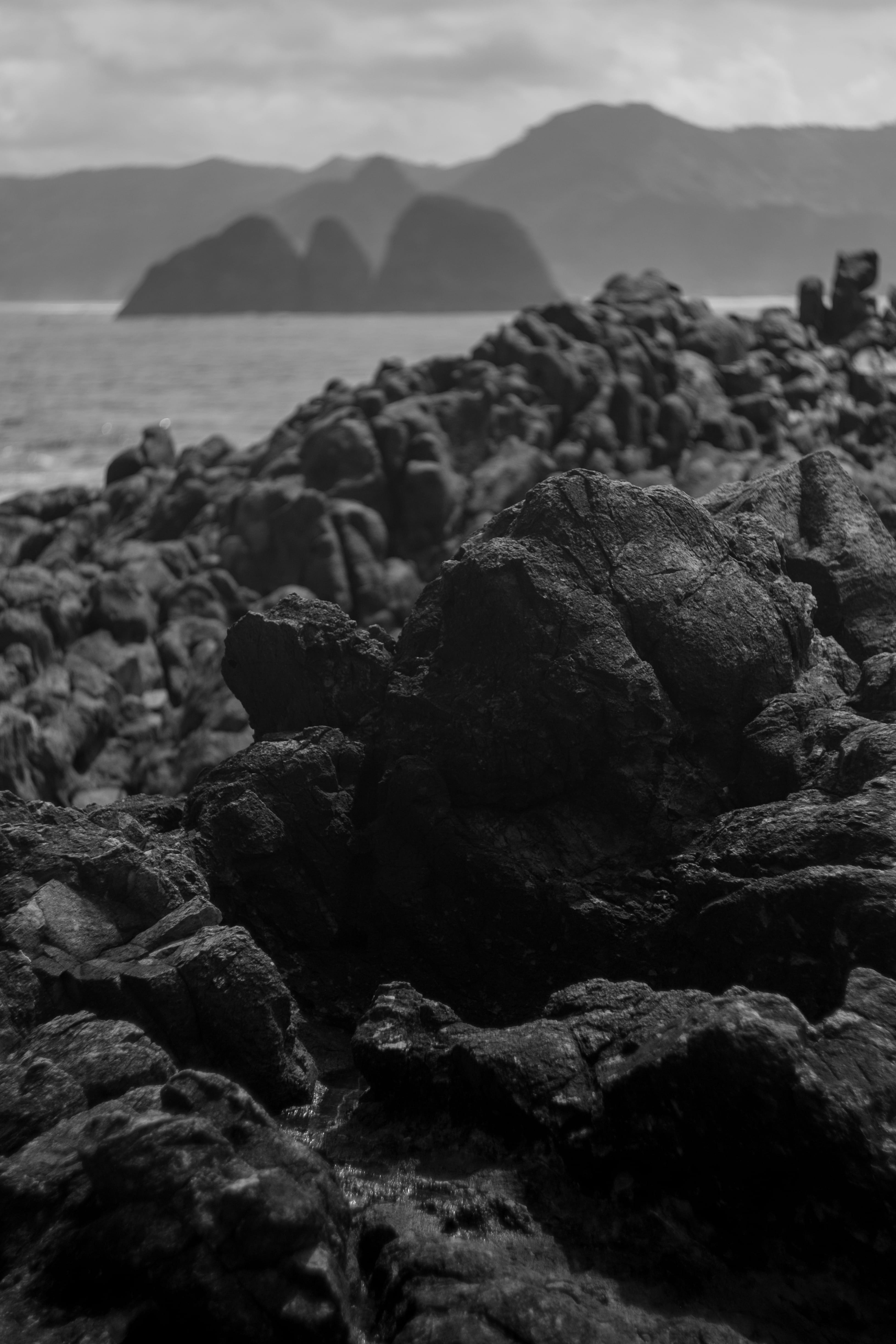 rock - object, tranquility, details, idyllic, no people, sea, sky, indonesia, mountain, rock, pebble, outdoors, bw, day, land, beach, cliff, Phone HD Wallpaper