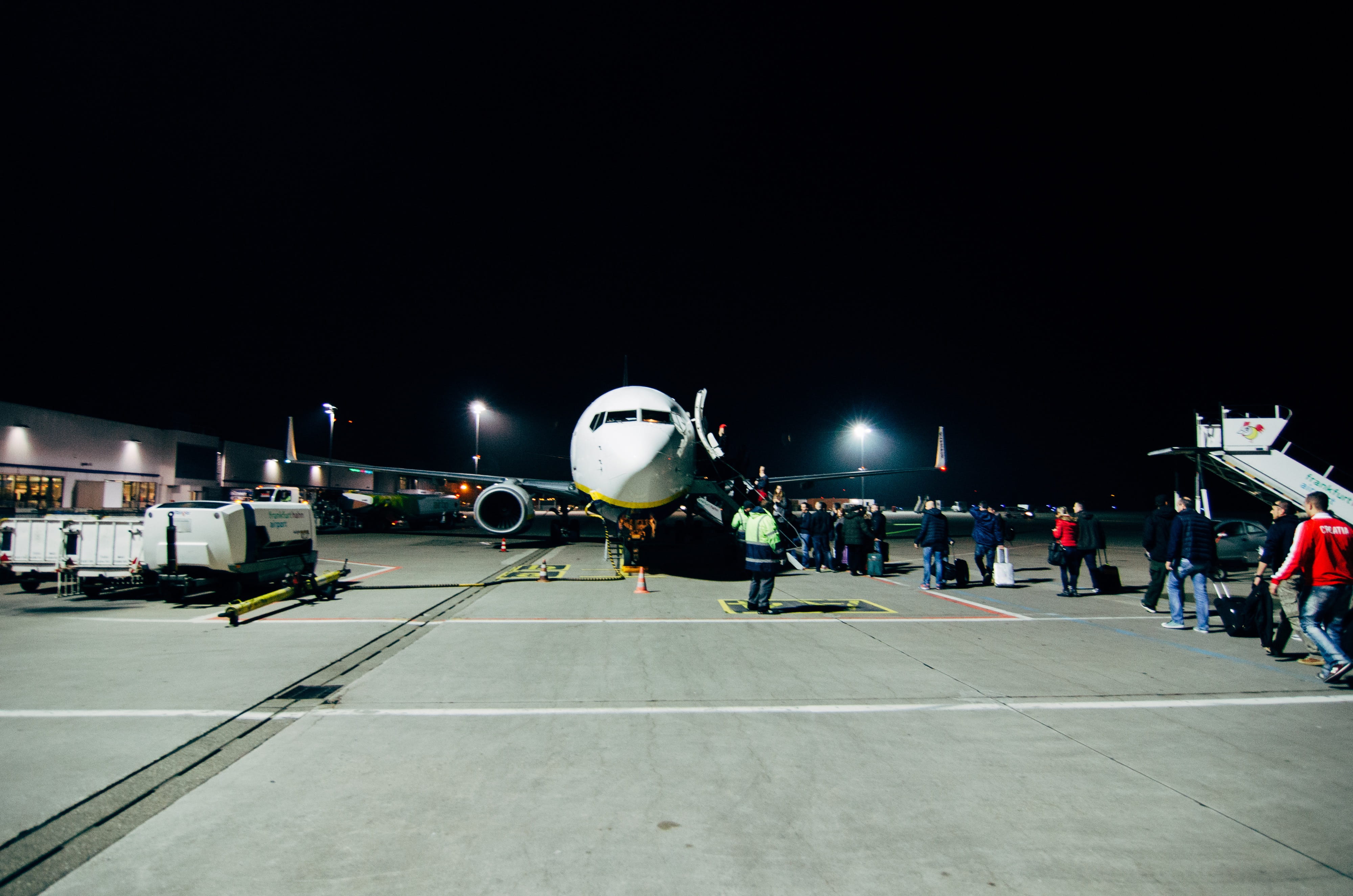 air vehicle, human, transportation, airport, people, germany, illuminated, frankfurt-hahn airport, large group of people, dark, vehicle, airport runway, HD Wallpaper