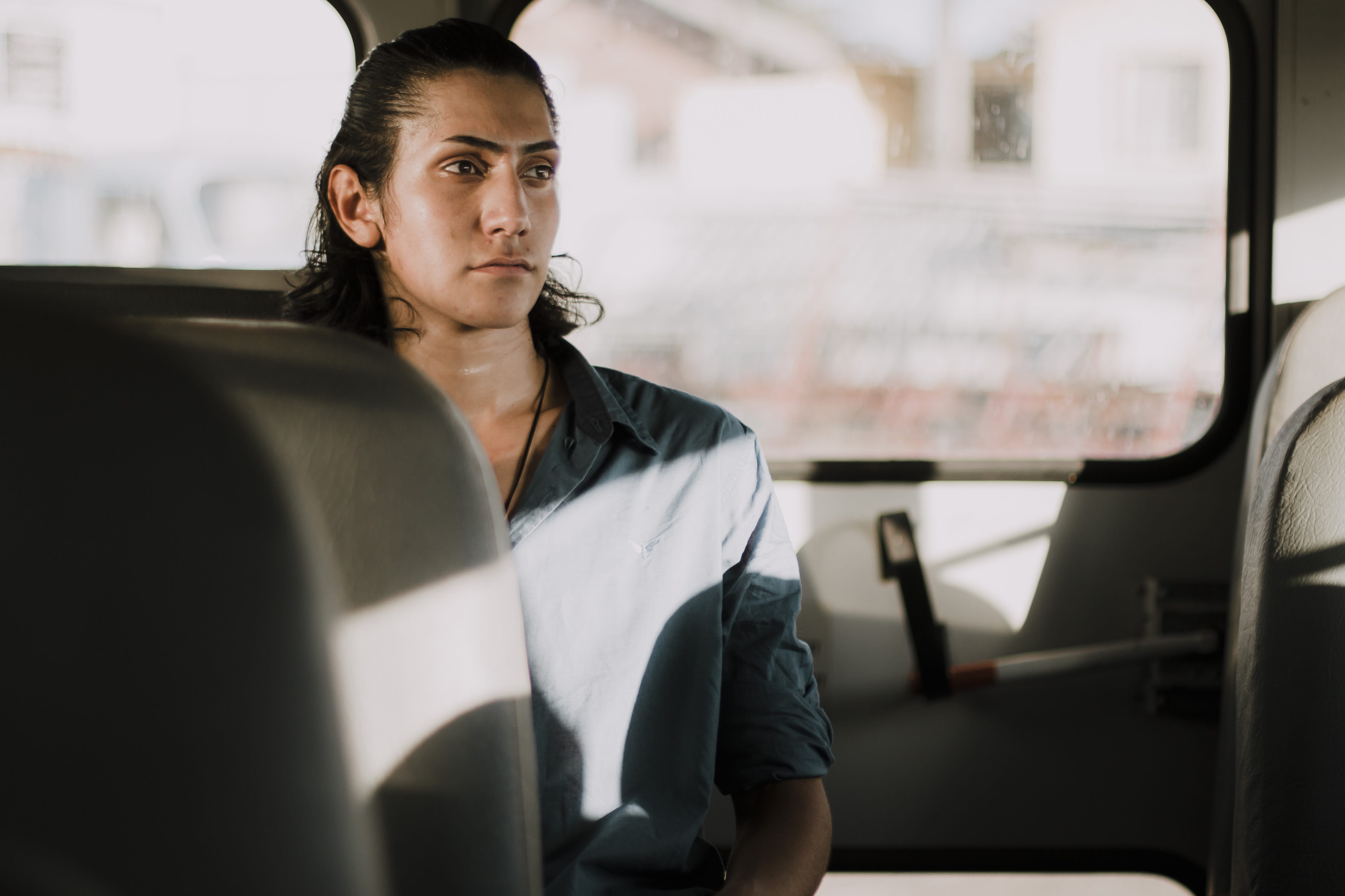 focus, adult, good-looking, male, portrait, looking away, glass - material, person, public transportation, pose, inside, blur, mode of transportation, depth of field, HD Wallpaper