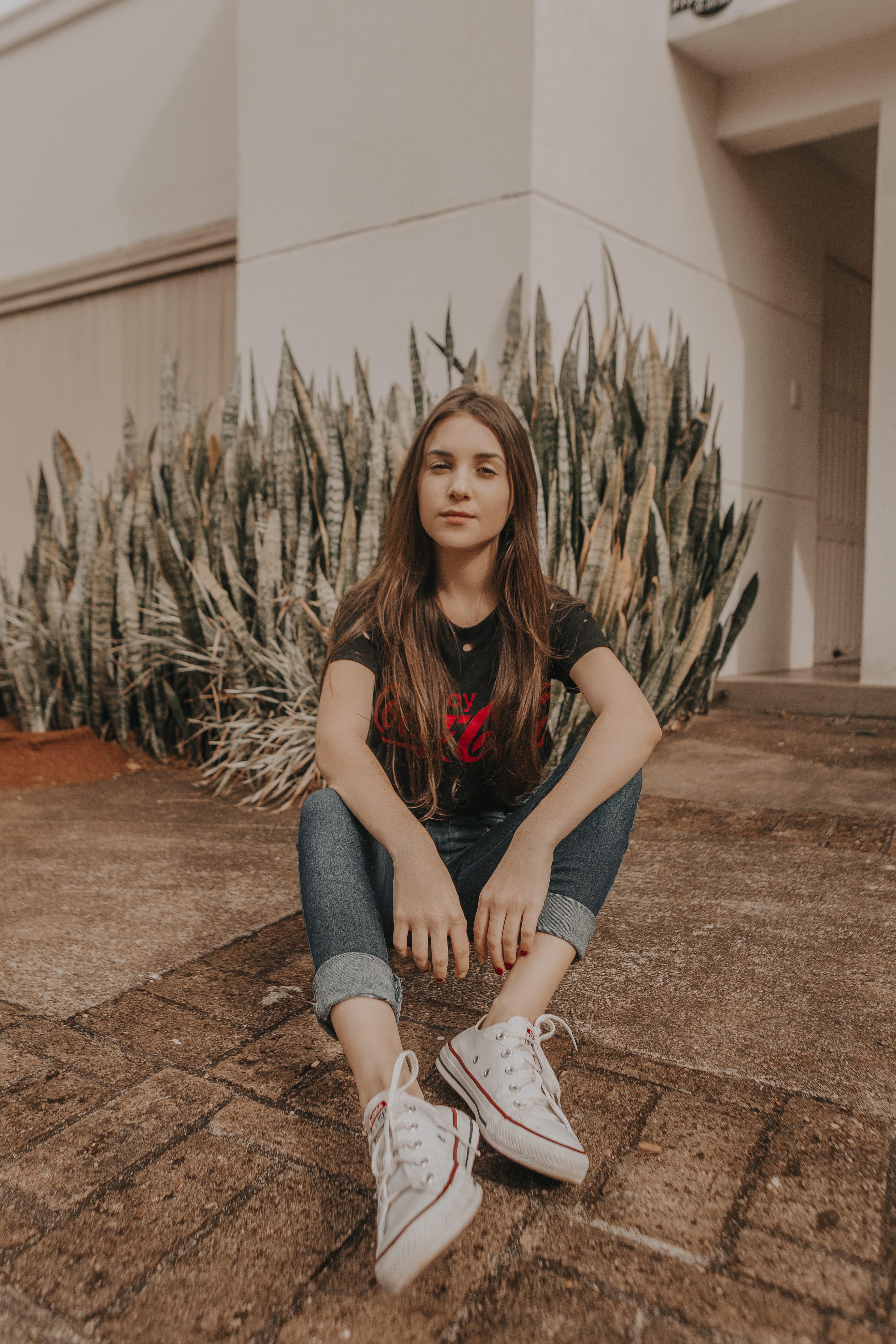 leisure activity, building, front, ground, trainers, building exterior, girl, gray, real people, portrait, built structure, mood, woman, female, pose, hairstyle, Phone HD Wallpaper