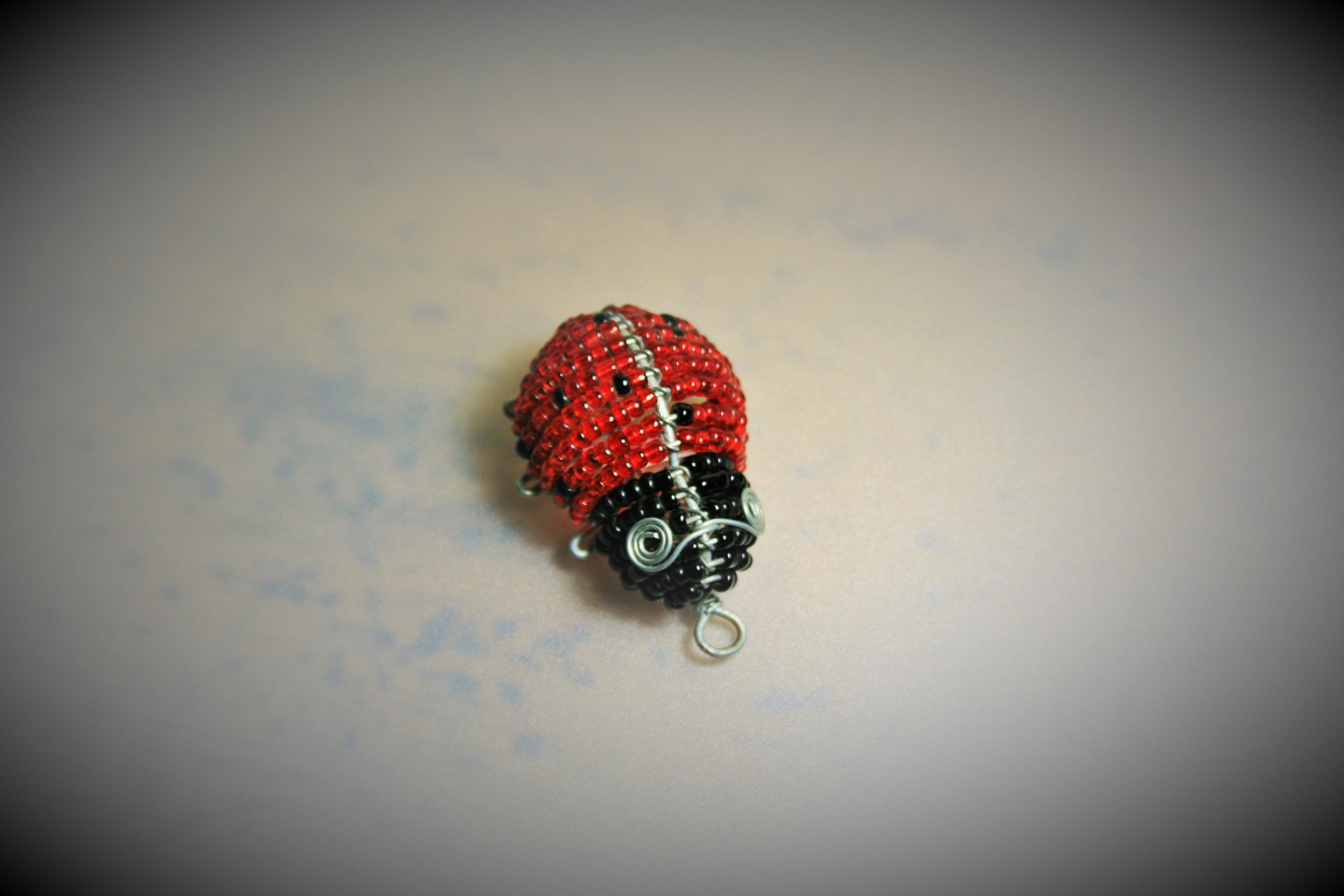 Ladybug, table, creativity, close-up, vignette, ball of wool, Beads, wool, still life, single object, Beetle, fruit, black, 4K, jewelry, ornament, studio shot, HD Wallpaper