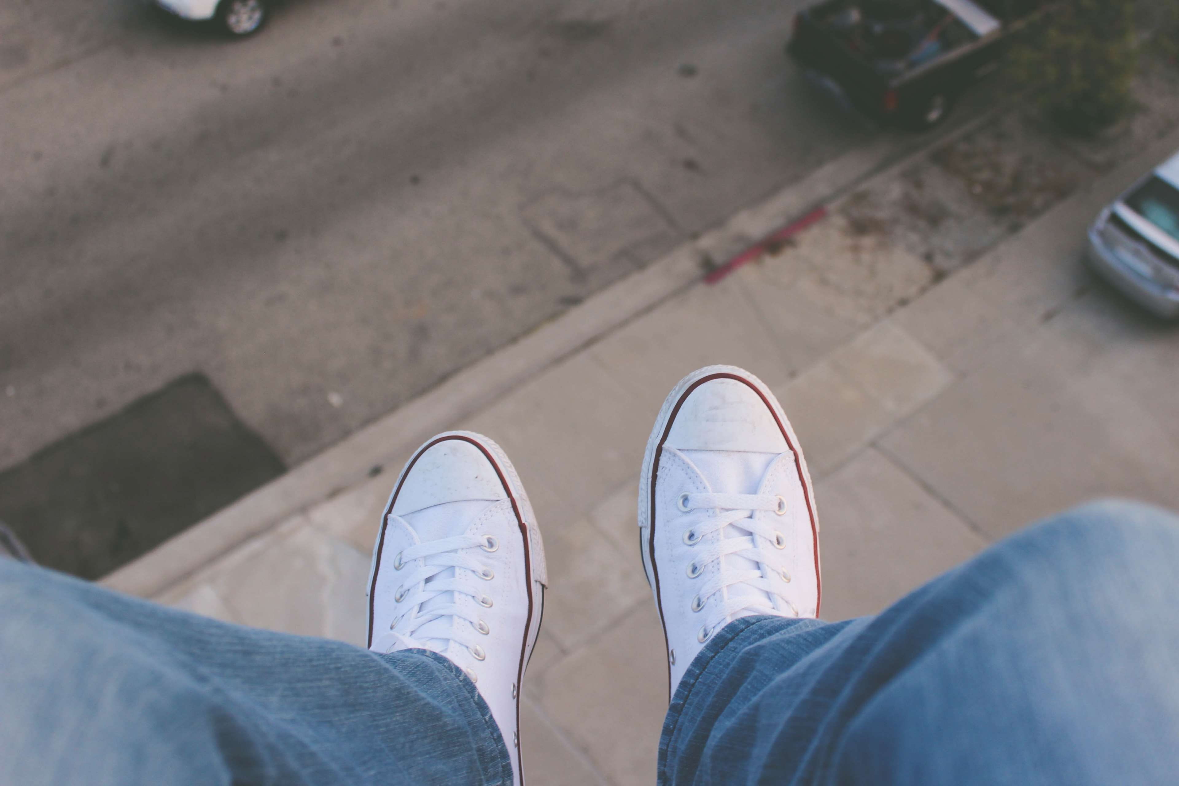 white, converse all star, human leg, outdoors, jeans, day, lifestyles, street, adult, low section, city, body part, men, personal perspective, human foot, HD Wallpaper