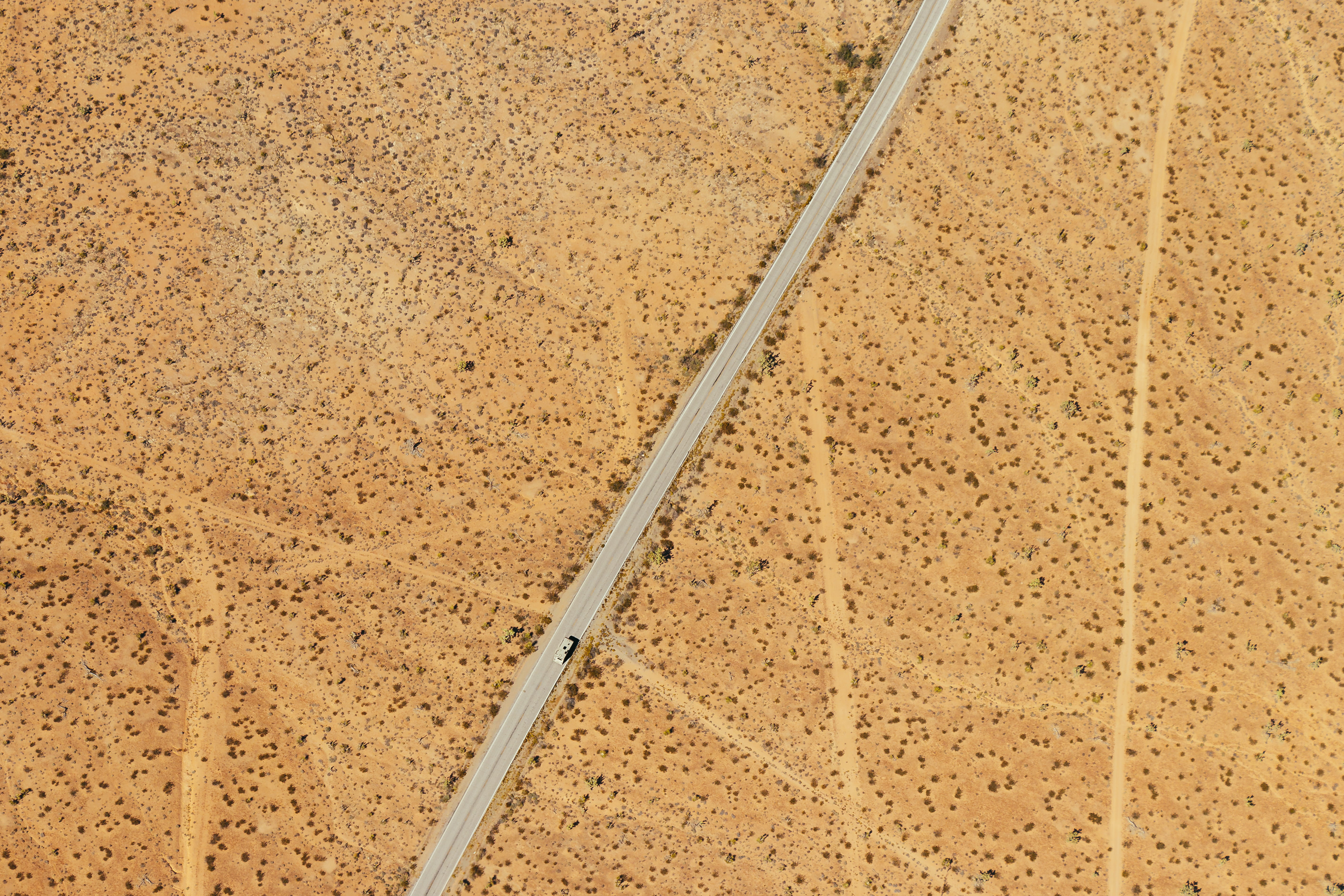 aerial, full frame, outdoors, pattern, environment, day, desert, arid climate, brown, high angle view, vast, metal, backgrounds, sand, textured, 5K, transportation, HD Wallpaper