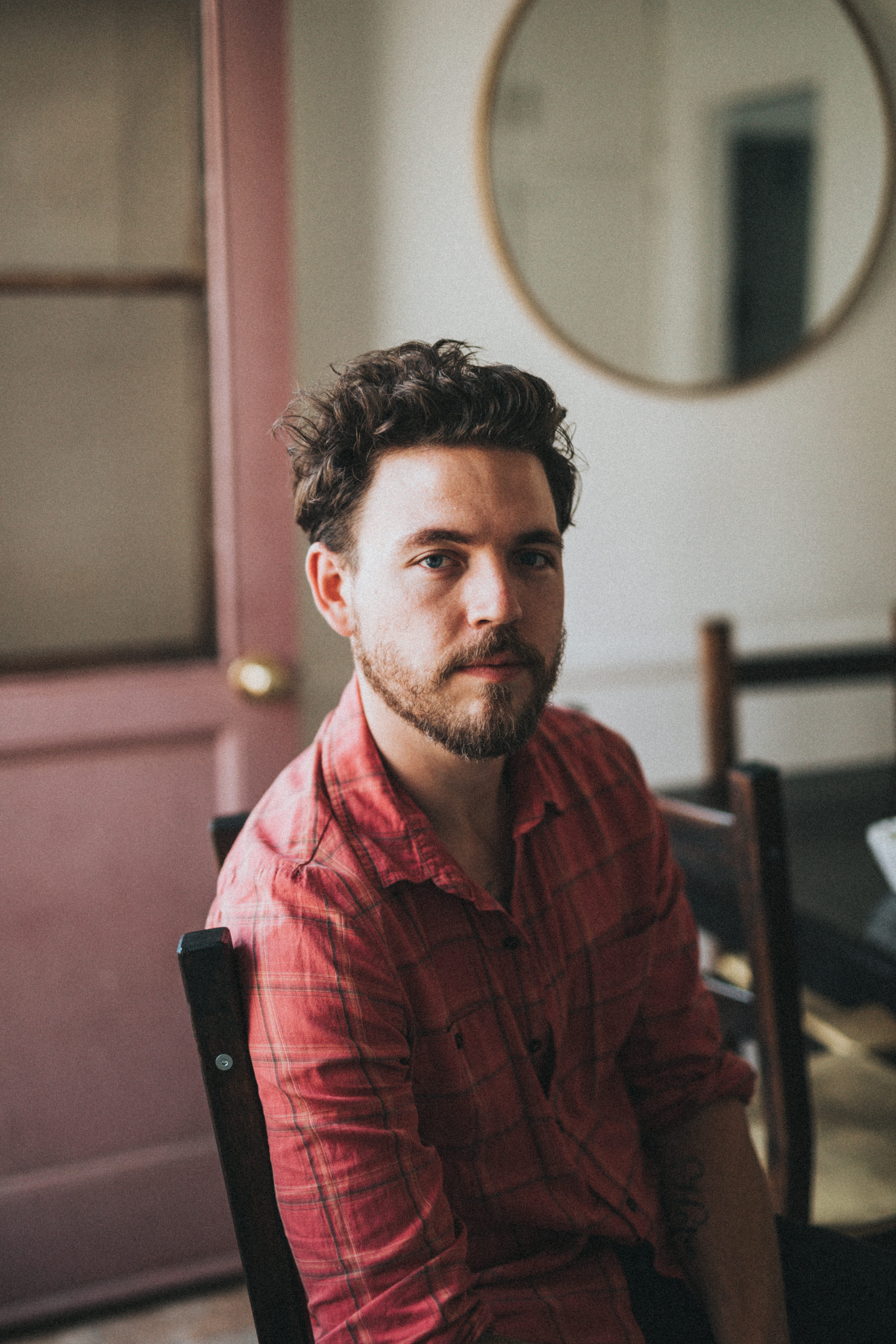 hairstyle, one person, indoors, front view, beard, young men, sitting, guy, shirt, contemplation, standing, real people, person, people, home, young adult, Phone HD Wallpaper