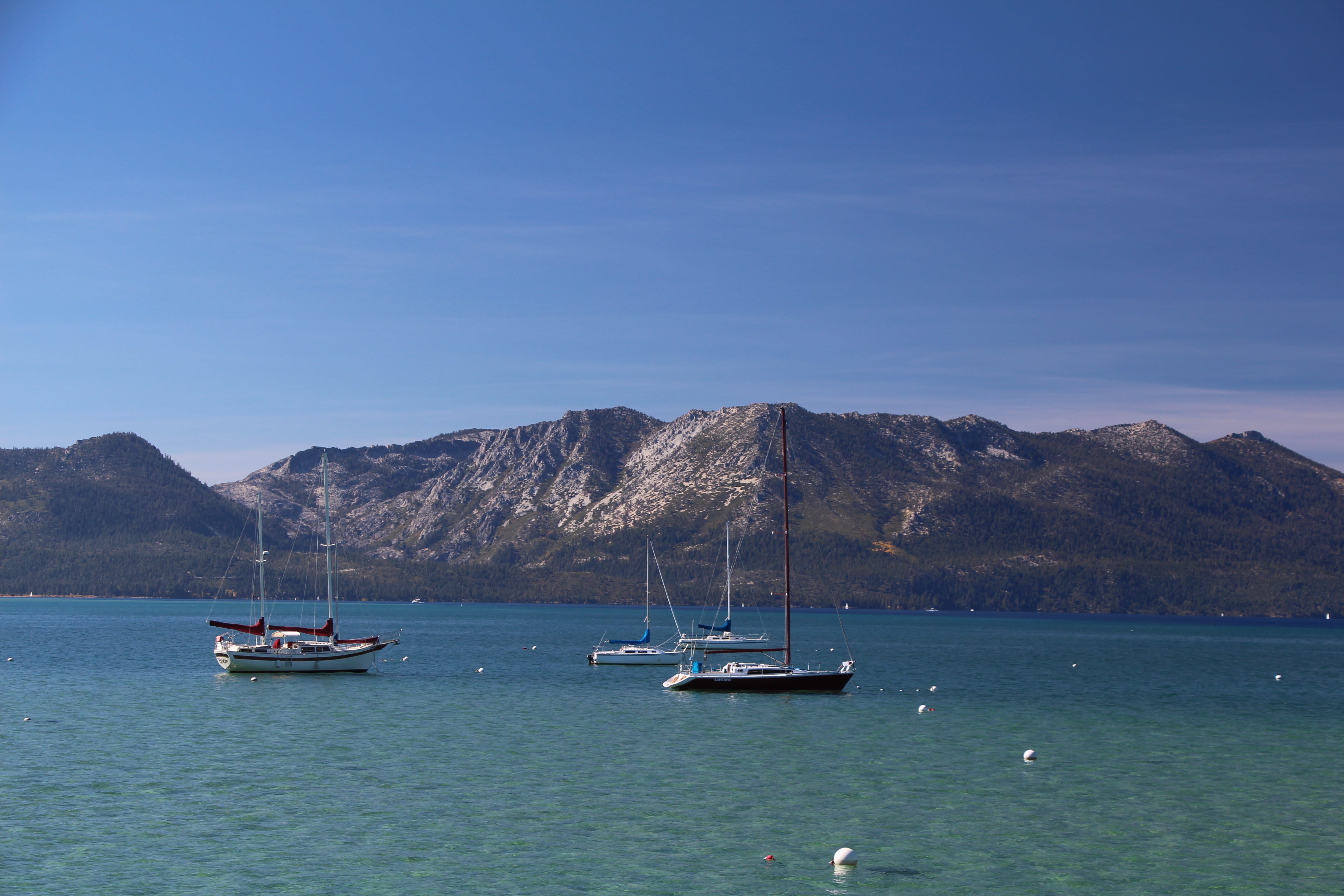 water, mountain range, fishing boat, travel, outdoors, mountain, tahoe, float, Boats, tranquil scene, anchored, sea, beauty in nature, boat, sailboat, leisure, HD Wallpaper