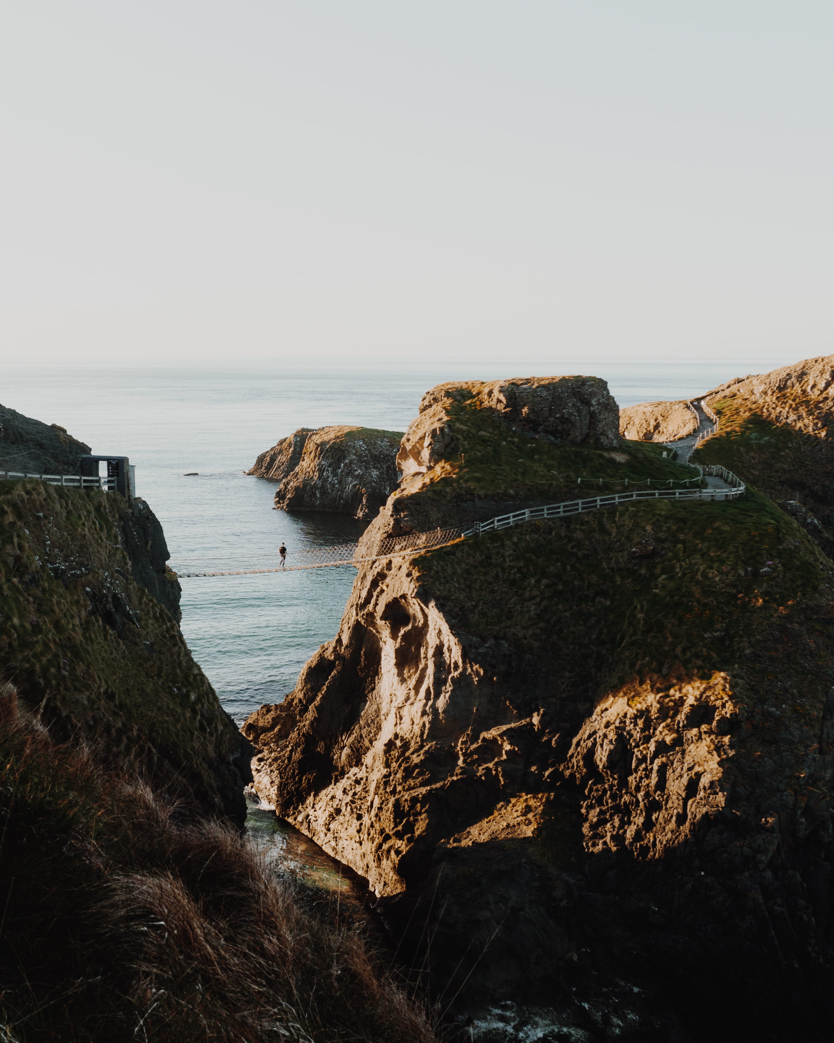 clear sky, beauty in nature, rock formation, cliff, solid, horizon over water, scenics - nature, person, lock screen background, tranquility, outdoors, Phone HD Wallpaper