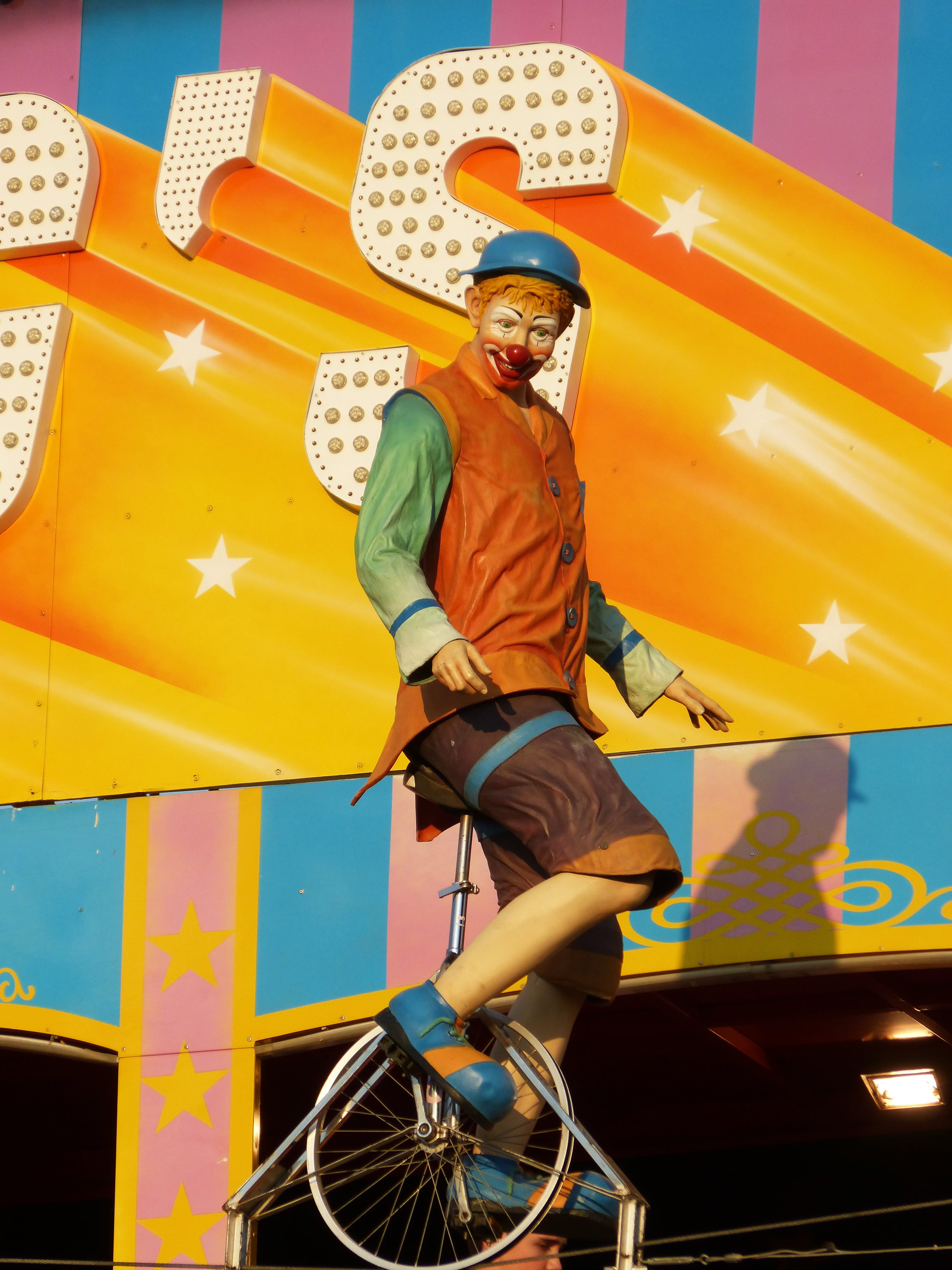 leisure activity, mode of transportation, one person, outdoors, circus, yellow, riding, fair, young adult, casual clothing, looking away, unicycle, transportation, Phone HD Wallpaper