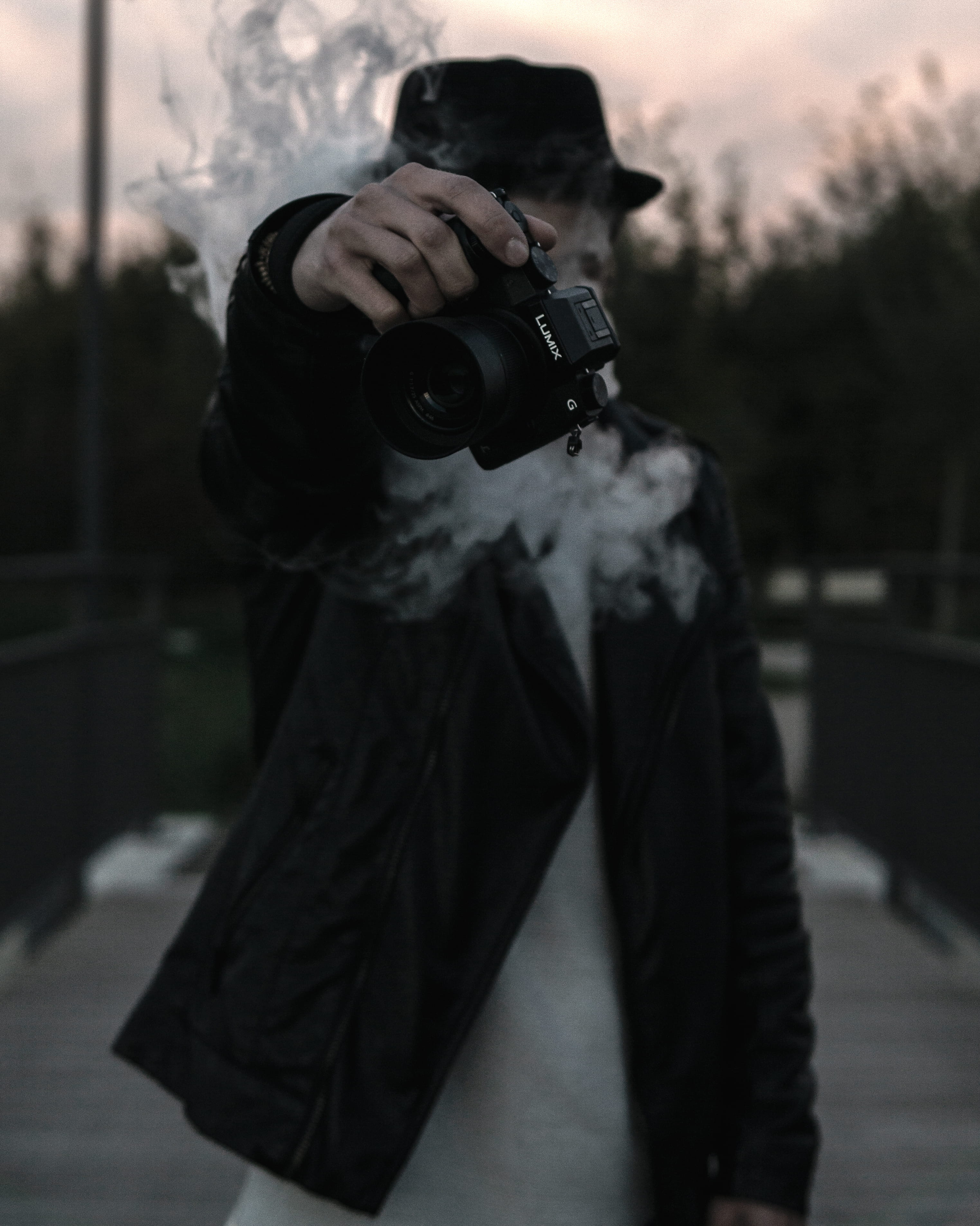 holding, man, activity, Pistol, lumix, people, gun, technology, dslr, front view, jacket, hand, rifle, weapon, panasonic, occupation, black, outfit, paparazzi, Phone HD Wallpaper