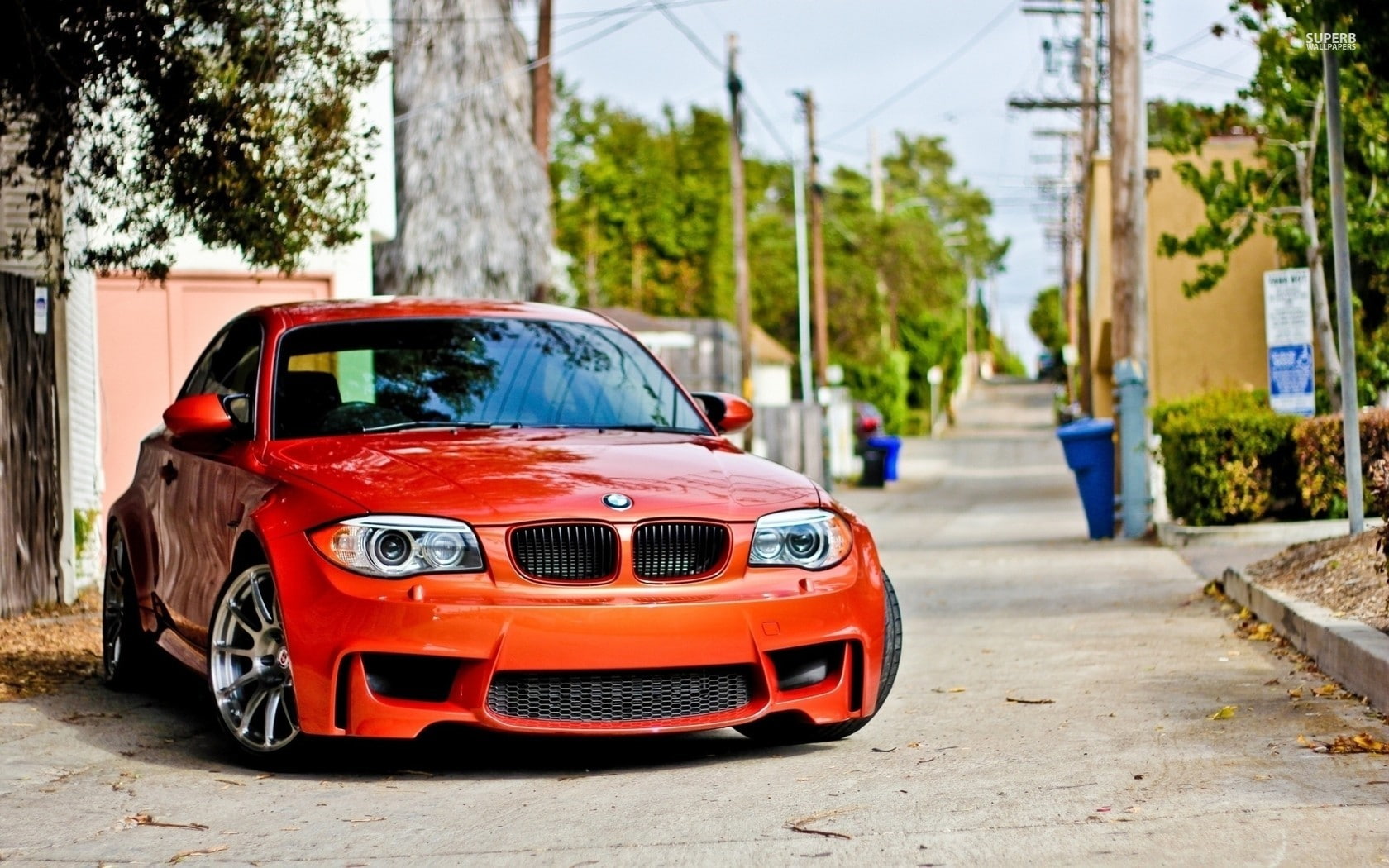 red, tree, car, sunlight, motor vehicle, land vehicle, focus on foreground, building exterior, city, road, outdoors, nature, stationary, architecture, mode of transportation, HD Wallpaper