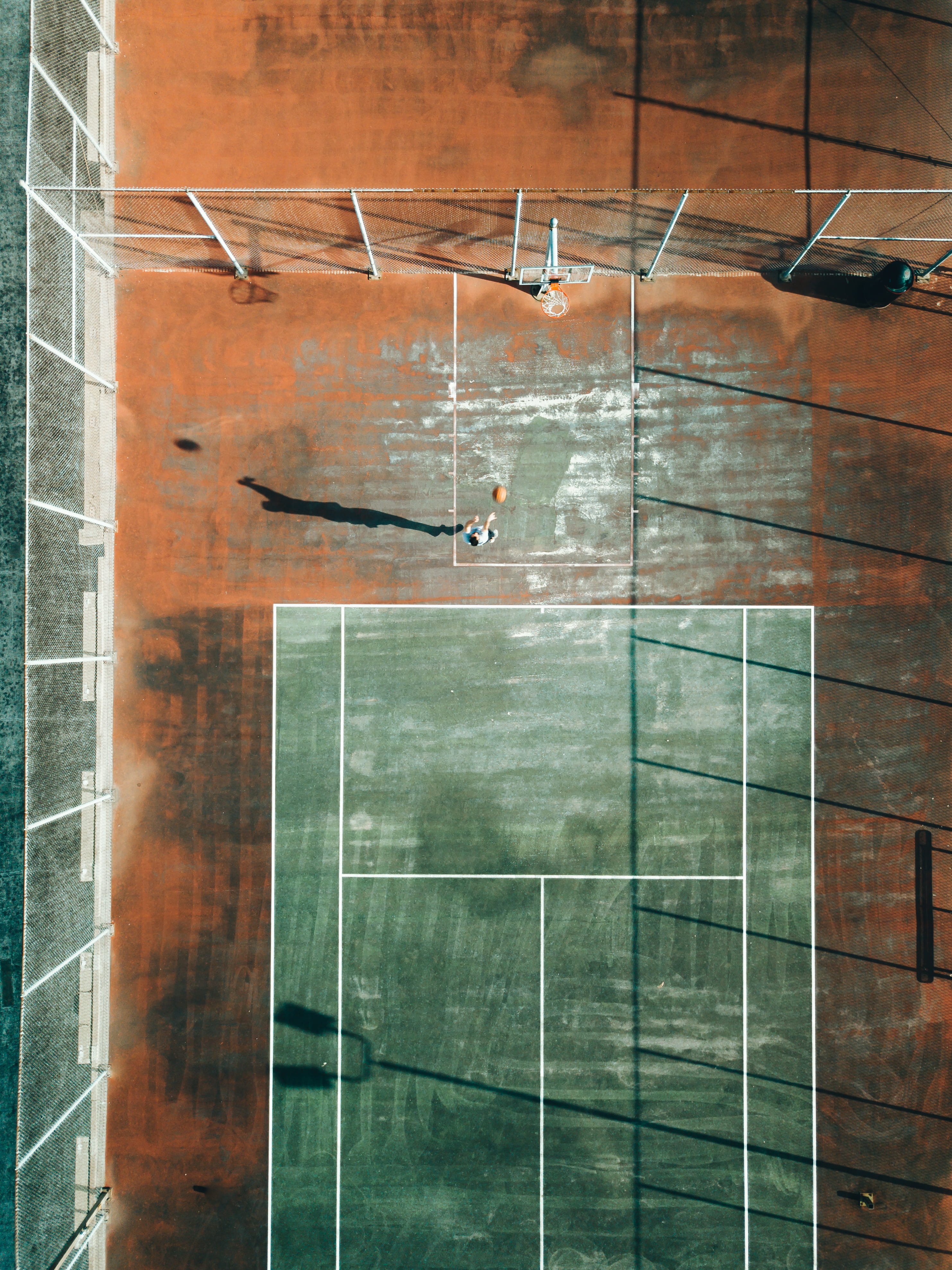 wall, brick, man, playing, top, photography, 4K, concrete, streetball, glass - material, built structure, mavicpro, outdoors, sunlight, nature, court, Phone HD Wallpaper