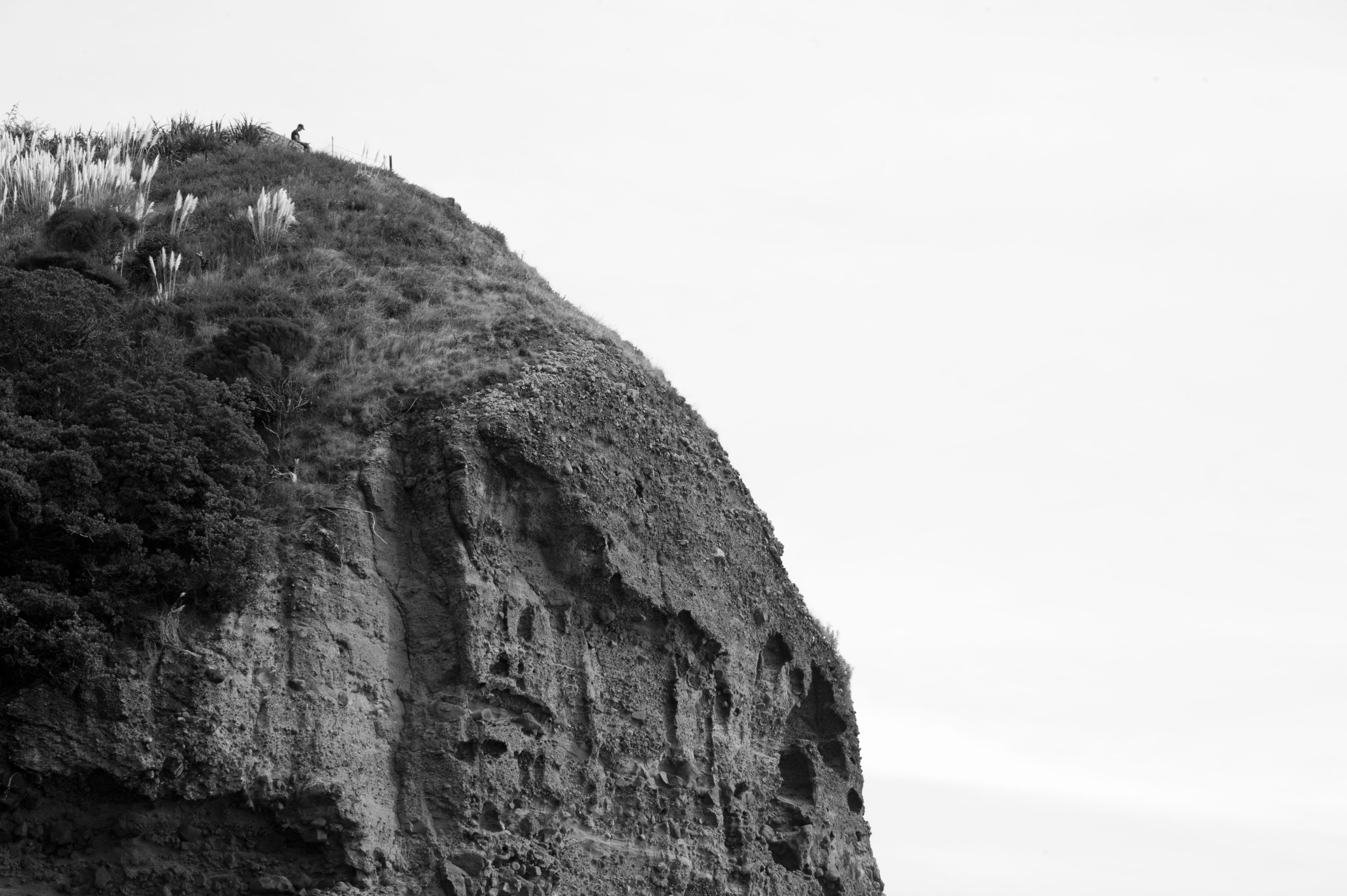 beauty in nature, cliff, copy space, day, rough, hope, outdoors, auckland, alone, rock, mediation, rock formation, new zealand, sky, land, solid, mountain, HD Wallpaper