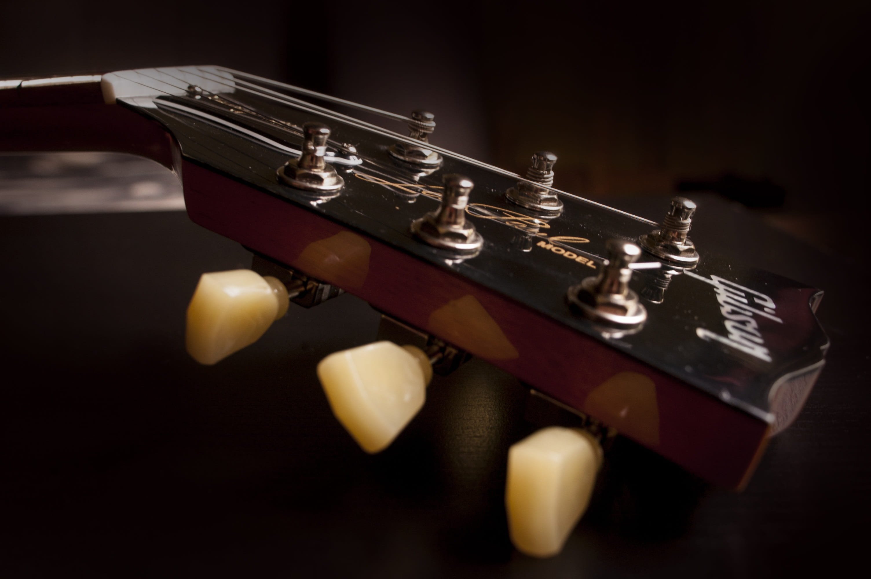 indoors, black background, arts culture and entertainment, musical instrument string, electric guitar, instrument, string instrument, headstock, still life, HD Wallpaper