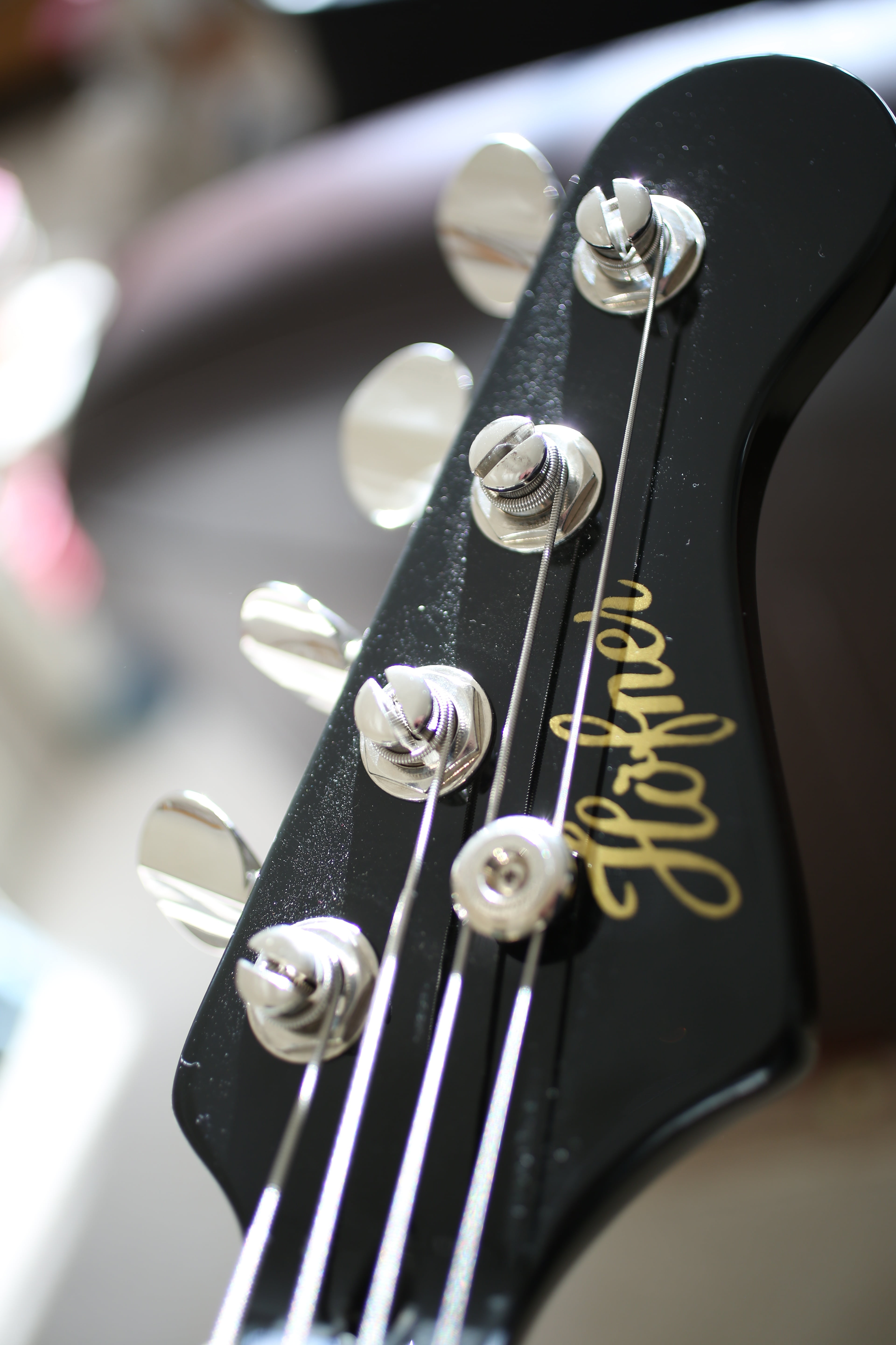 guitar head, still life, guitar, hanging, text, metal, 5K, creativity, string instrument, arts culture and entertainment, high angle view, bass, no people, Phone HD Wallpaper