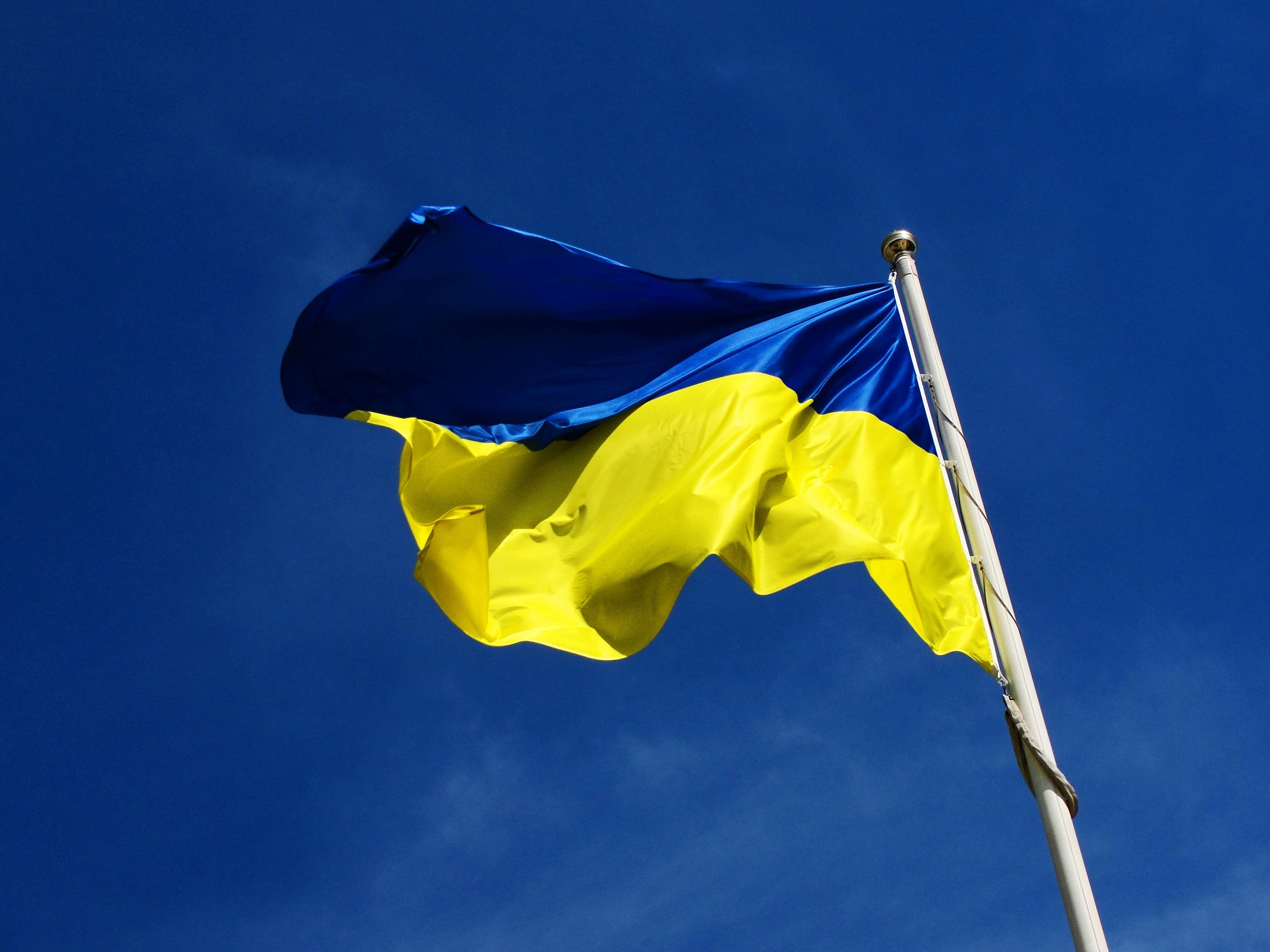low angle view, clear sky, waving flag, outdoors, symbol, nature, copy space, national flag, flag, ukraine, 2K, yellow, environment, motion, sky, patriotism, HD Wallpaper