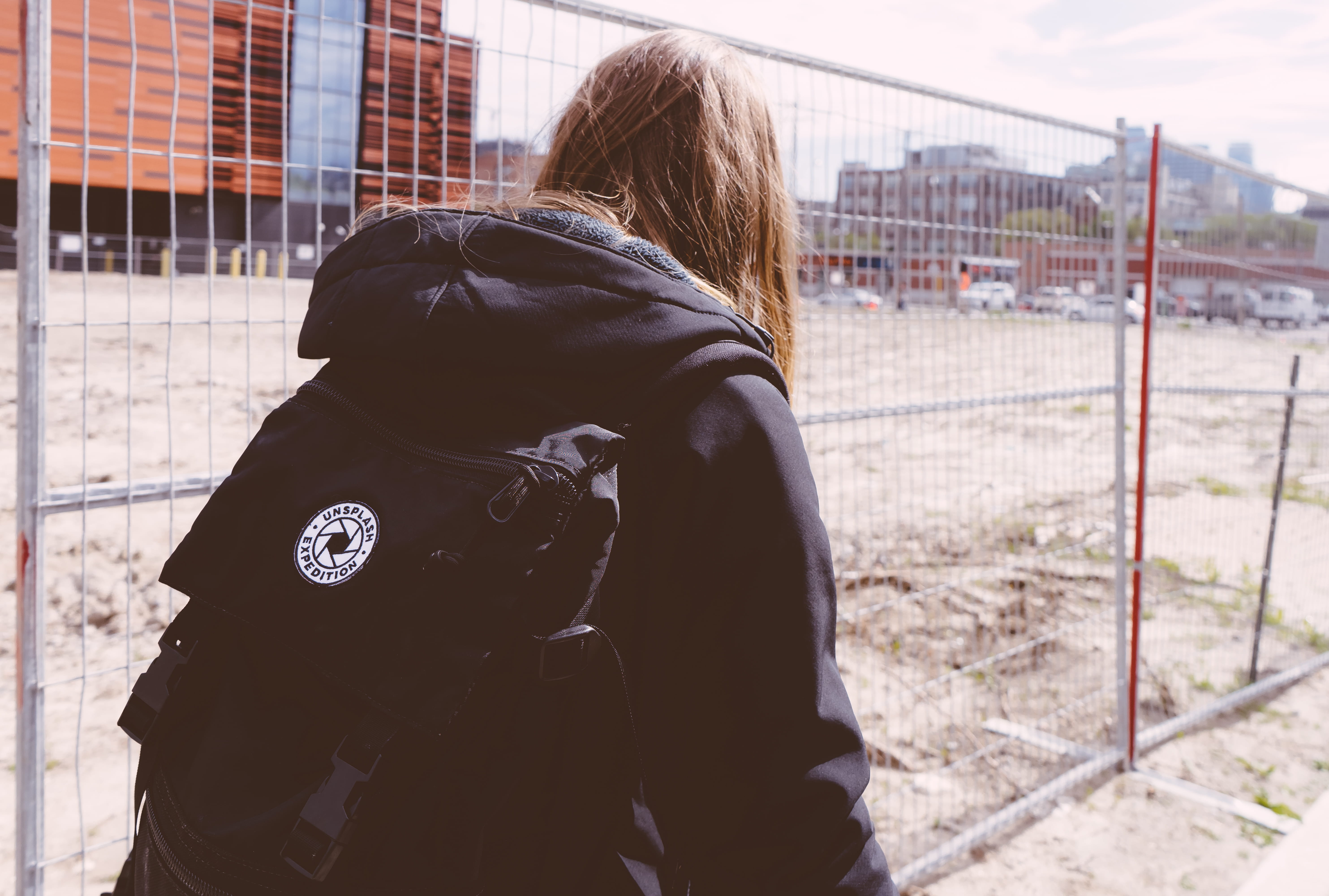 lot, hood - clothing, day, urban, leisure activity, 5K, one person, rear view, casual clothing, downtown, woman, exploration, standing, person, adult, HD Wallpaper